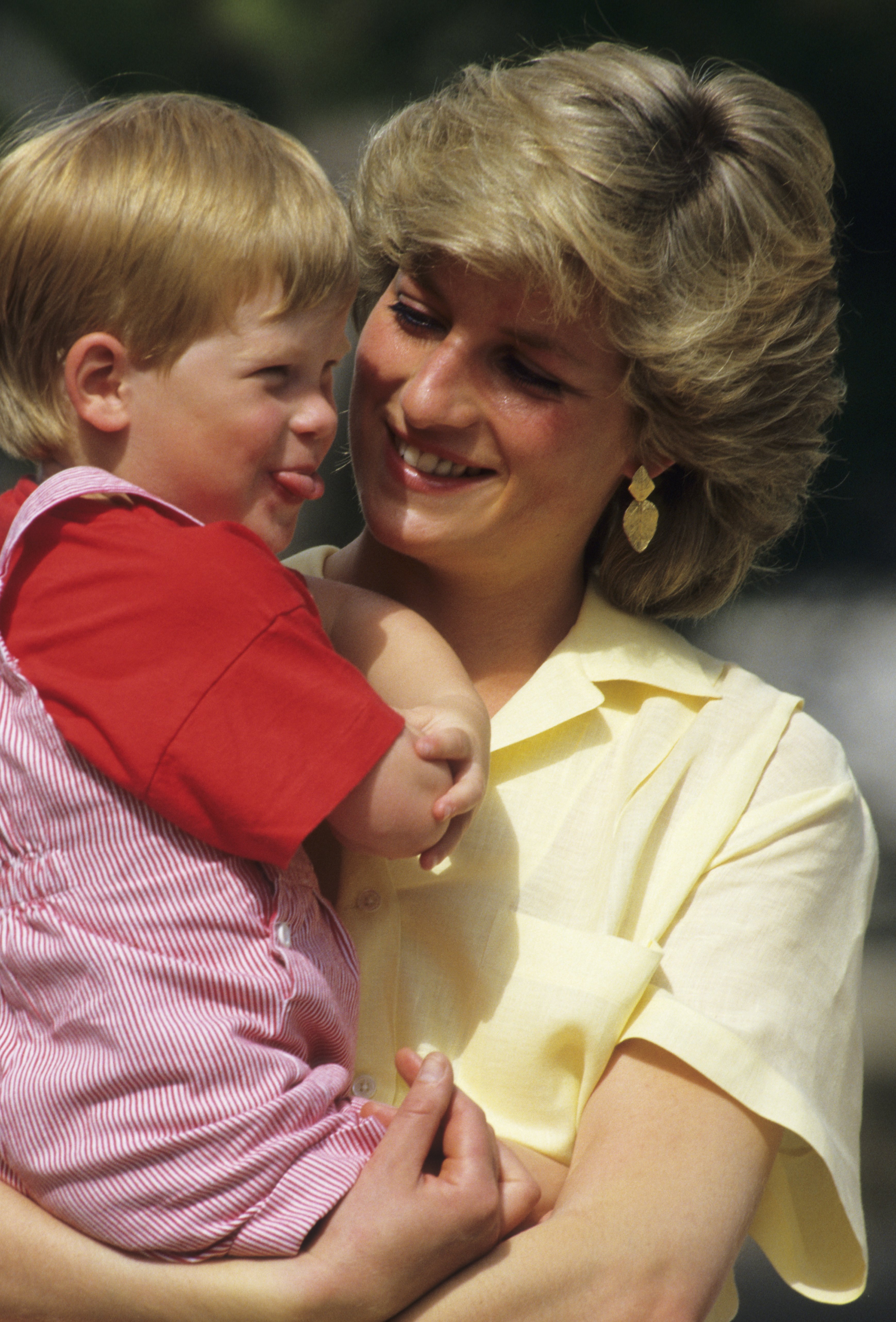 Princess Diana pictured with Prince Harry on holiday on August 10, 1987 in Majorca, Spain . / Source: Getty Images