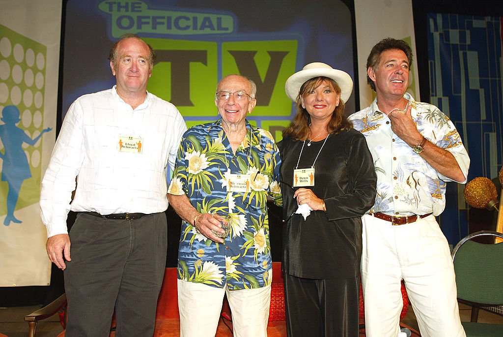 Lloyd Schwartz, Sherwood Schwartz, Dawn Wells and Barry Williams. Image Credit: Getty Images