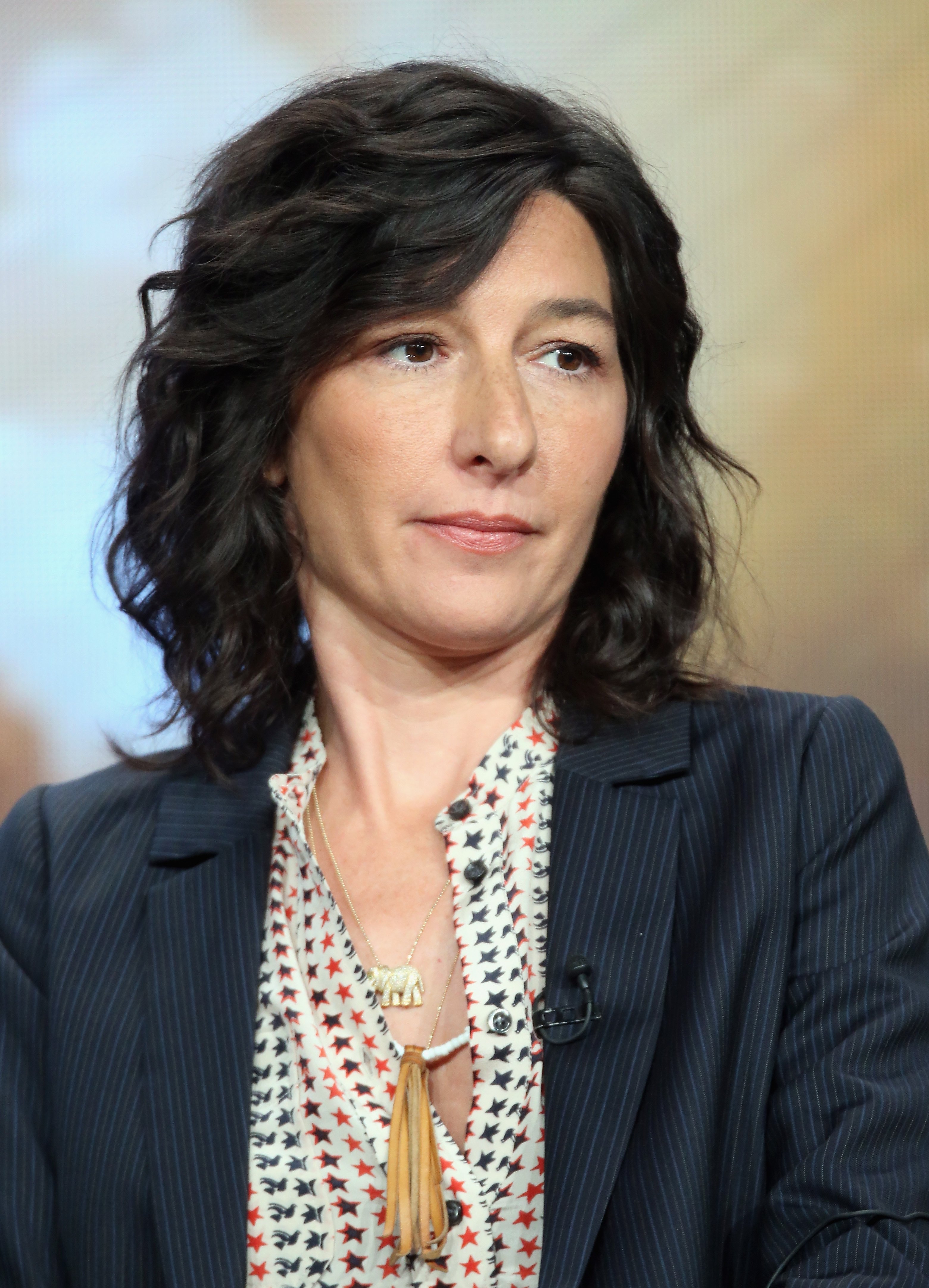 Ali Adler speak onstage at a panel discussion during The CW portion of the 2016 Television Critics Association Summer Tour at The Beverly Hilton Hotel on August 11, 2016 in Beverly Hills, California | Source: Getty Images