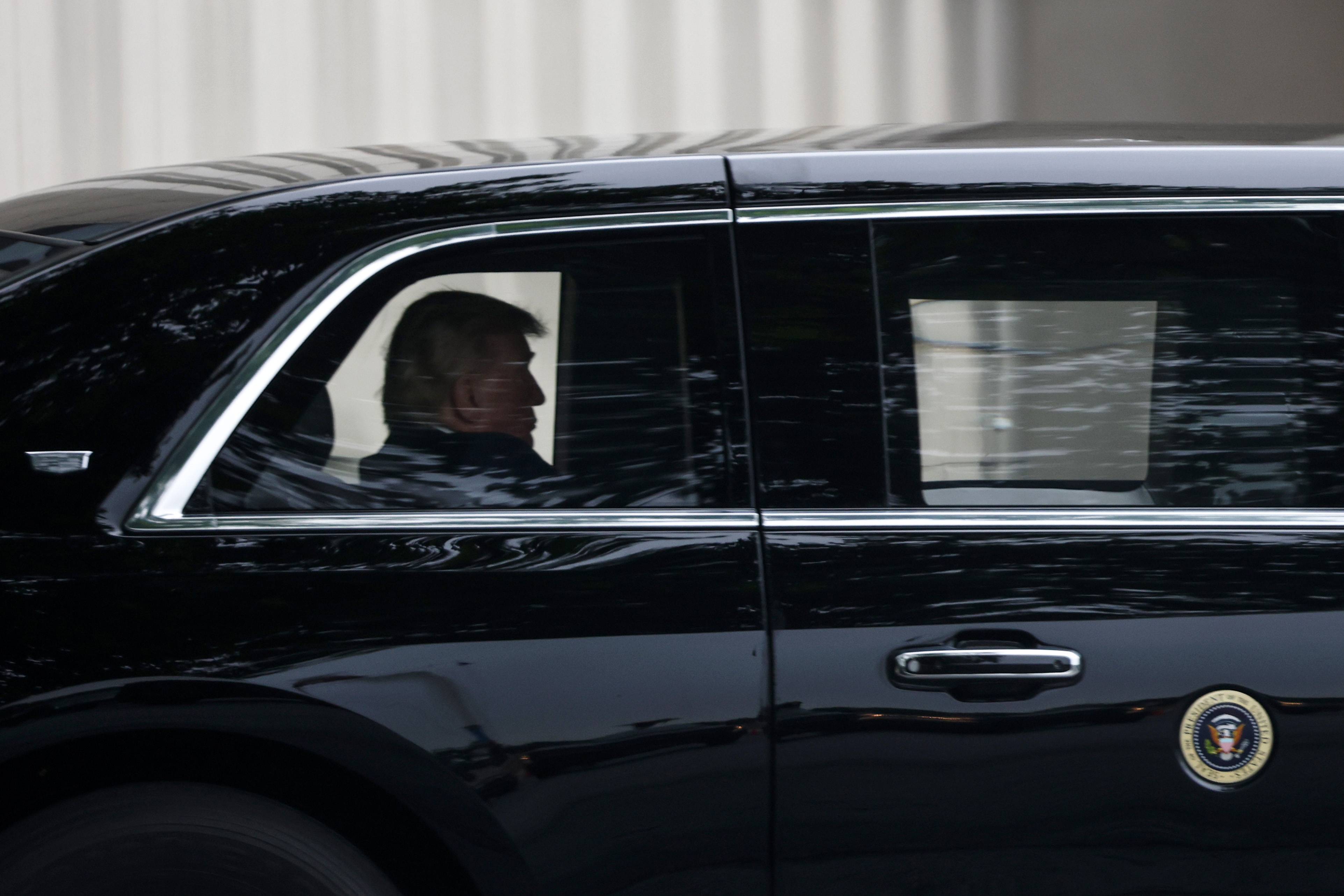 President Donald Trump is seen inside his vehicle at Walter Reed National Military Medical Center | Source: Getty Images