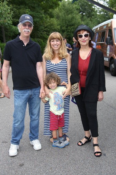 Steve Janowitz, Joy Behar with her daughter Eve Behar and grandson Luca at the 6th Annual Family Affair on July 19, 2014 | Photo: Getty Images