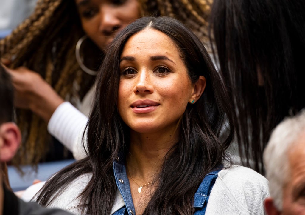 Megan Markle, The Duchess of Sussex, watches Serena Williams of the United States in action against Bianca Andreescu of Canada at Arthur Ashe Stadium at the USTA Billie Jean King National Tennis Center | Photo: Getty Images