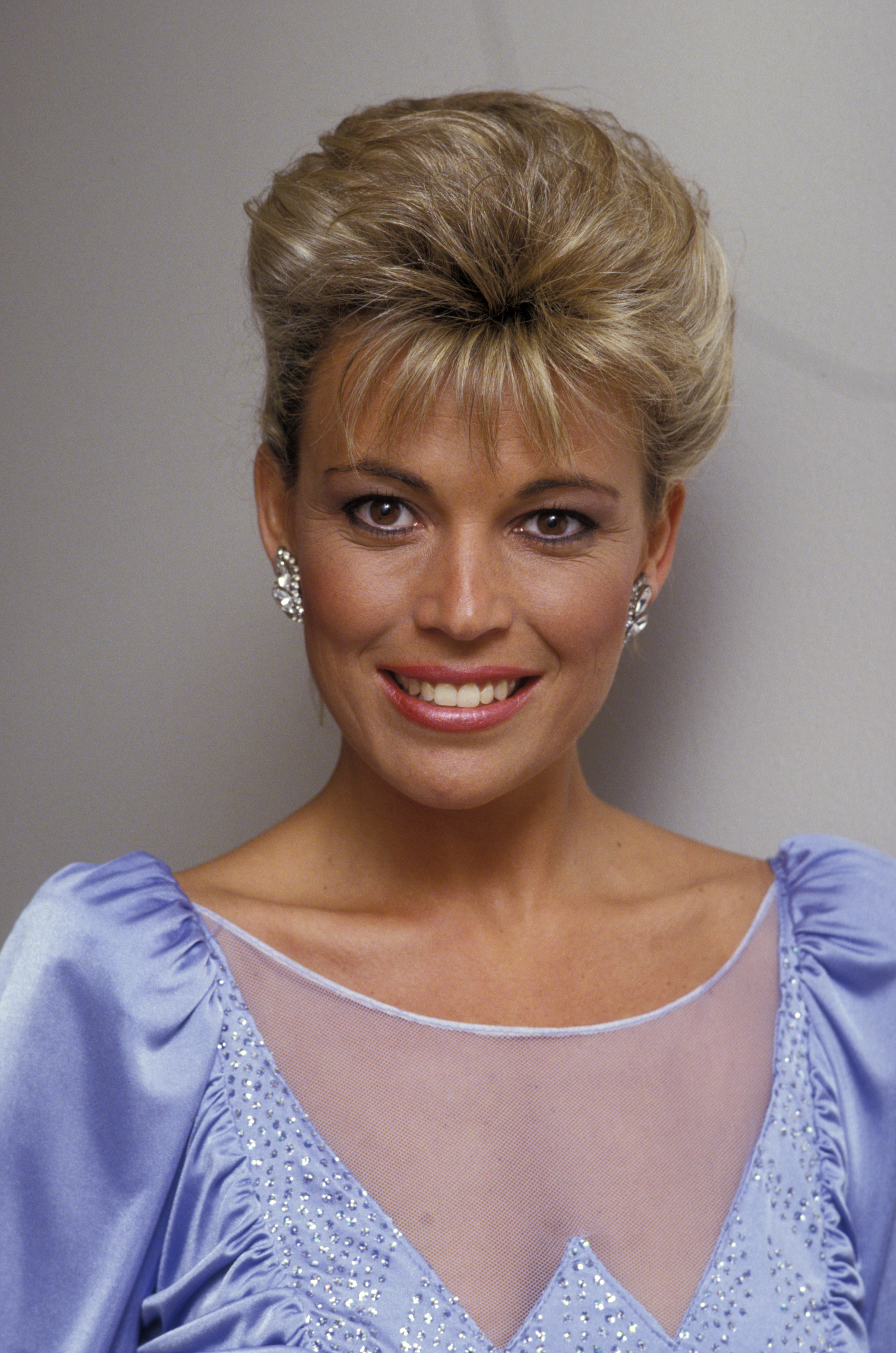 Vanna White wears a pale blue, embellished dress with sheer detailing while attending the taping of "Bob Hope's Easter Special" at NBC Studios in Burbank, California.