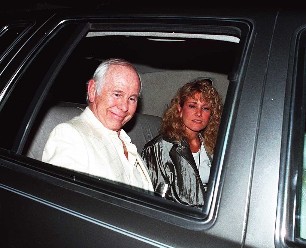 Johnny Carson and wife Alexis Leave Spago Restaurant After Dinner, August 11 1994 | Photo: GettyImages