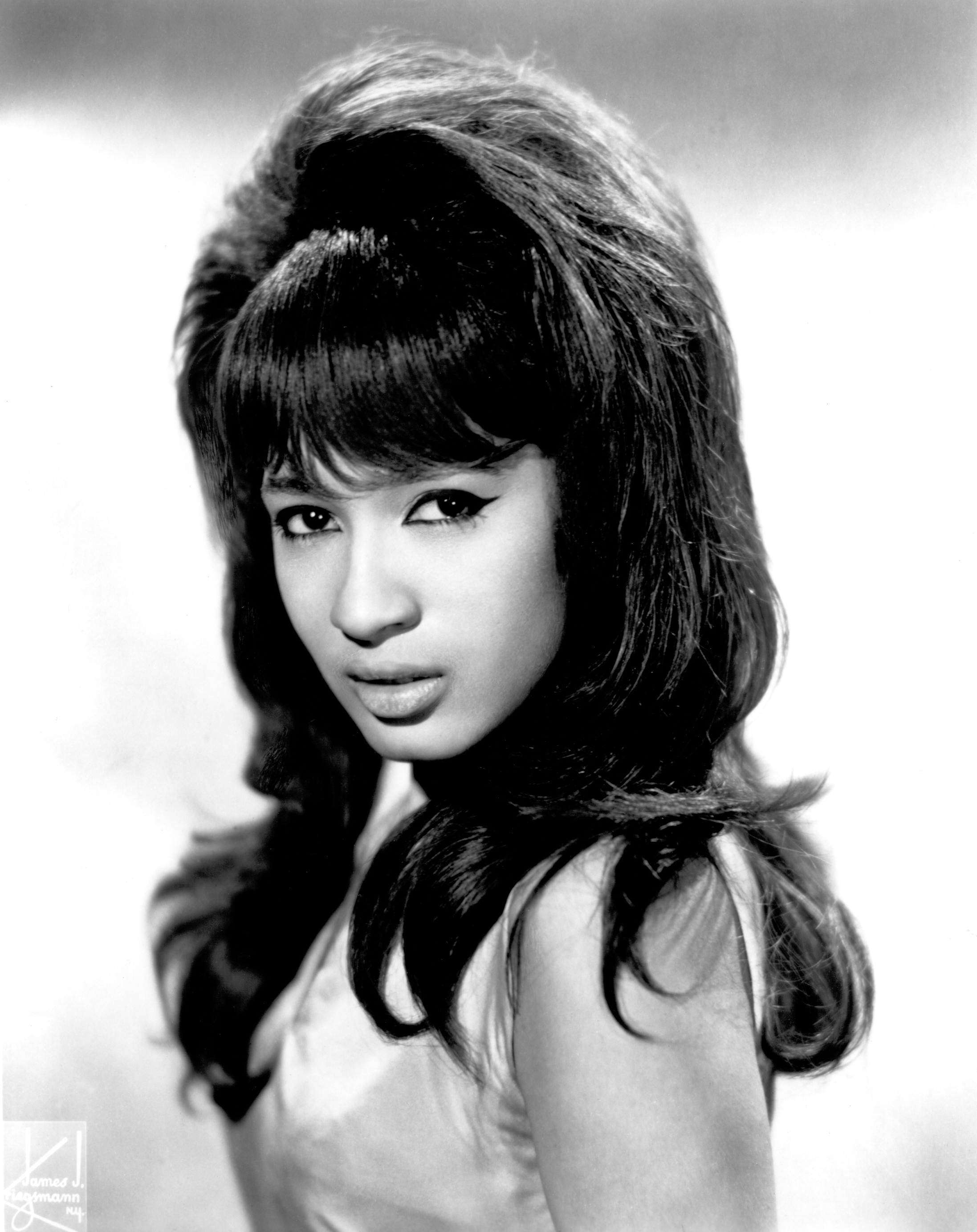 Ronnie Spector of the vocal trio "The Ronettes" pose for a portrait circa 1964 | Source: Getty Images