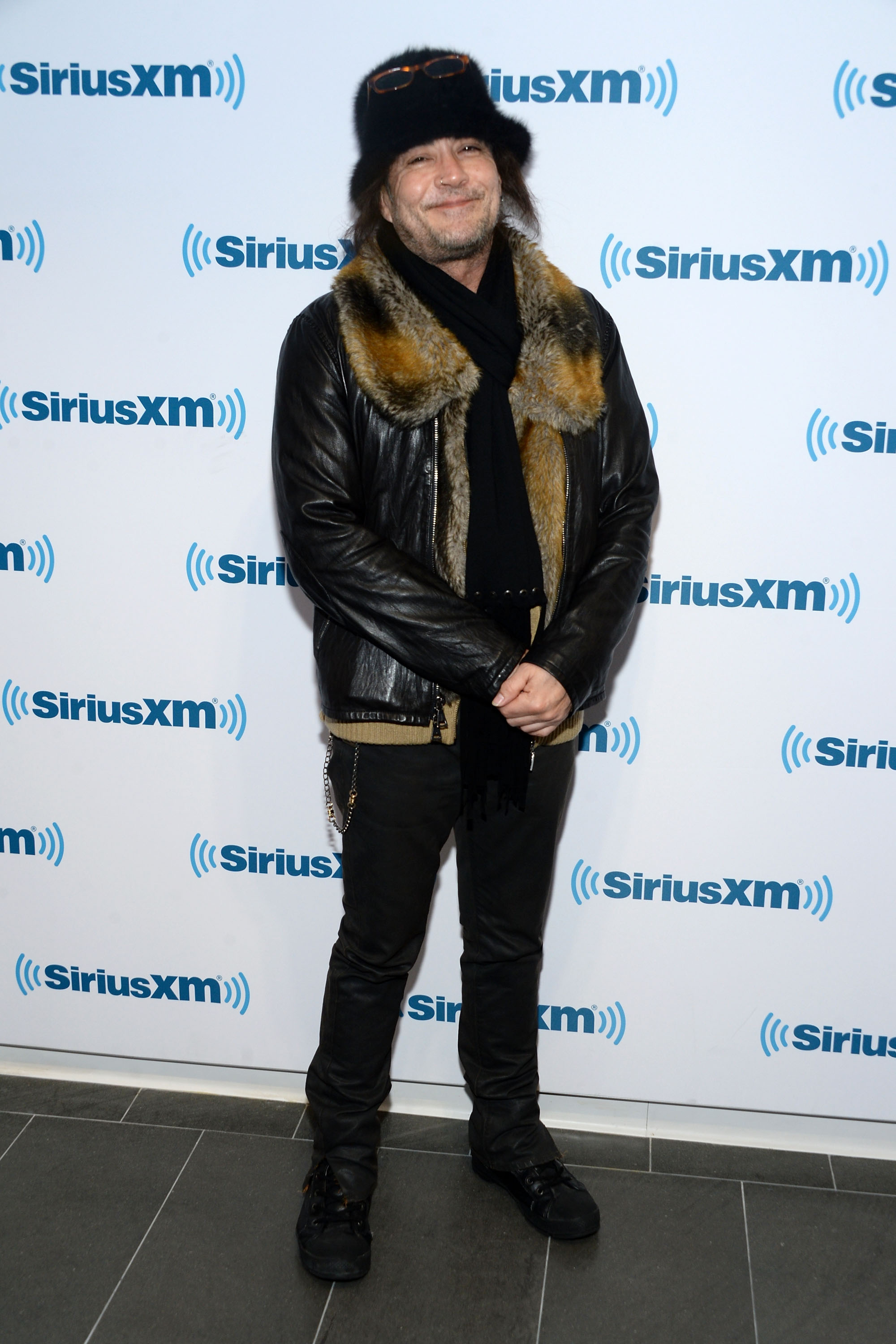 Jake E. Lee visits SiriusXM Studios on December 1, 2014, in New York City. | Source: Getty Images