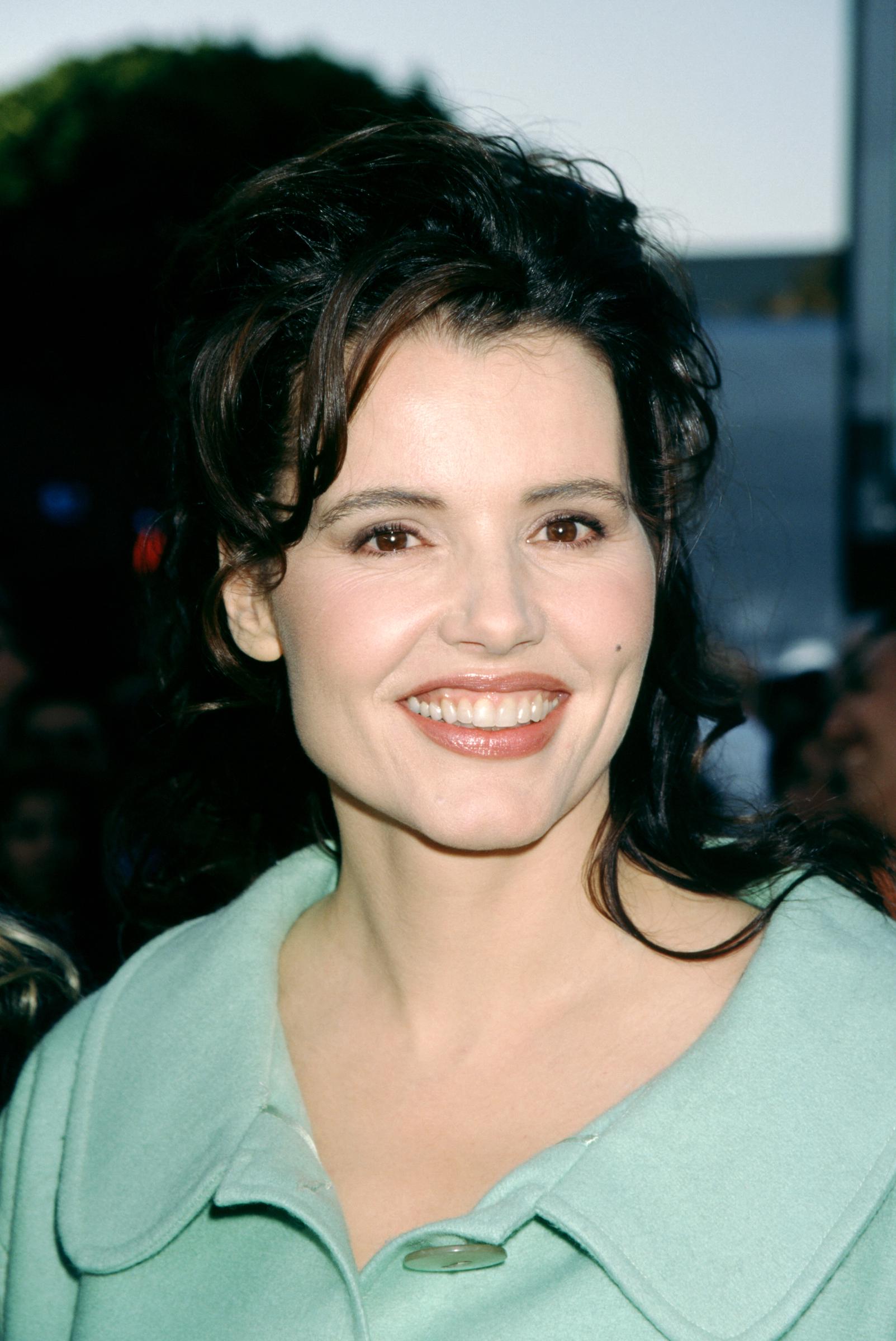 Geena Davis arrived at the premiere in a mint-colored coat and softly styled dark waves, serving understated elegance with every smile. Her fresh makeup and radiant expression added to the polished Hollywood look.