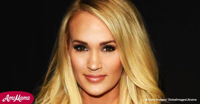 Carrie Underwood flaunts flawless legs in short black dress during July 4th celebration
