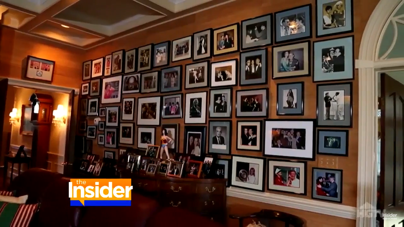 A personal wall of fame inside Robert Altman and Lynda Carter's estate in Potomac, Maryland | Source: YouTube/TheInsider