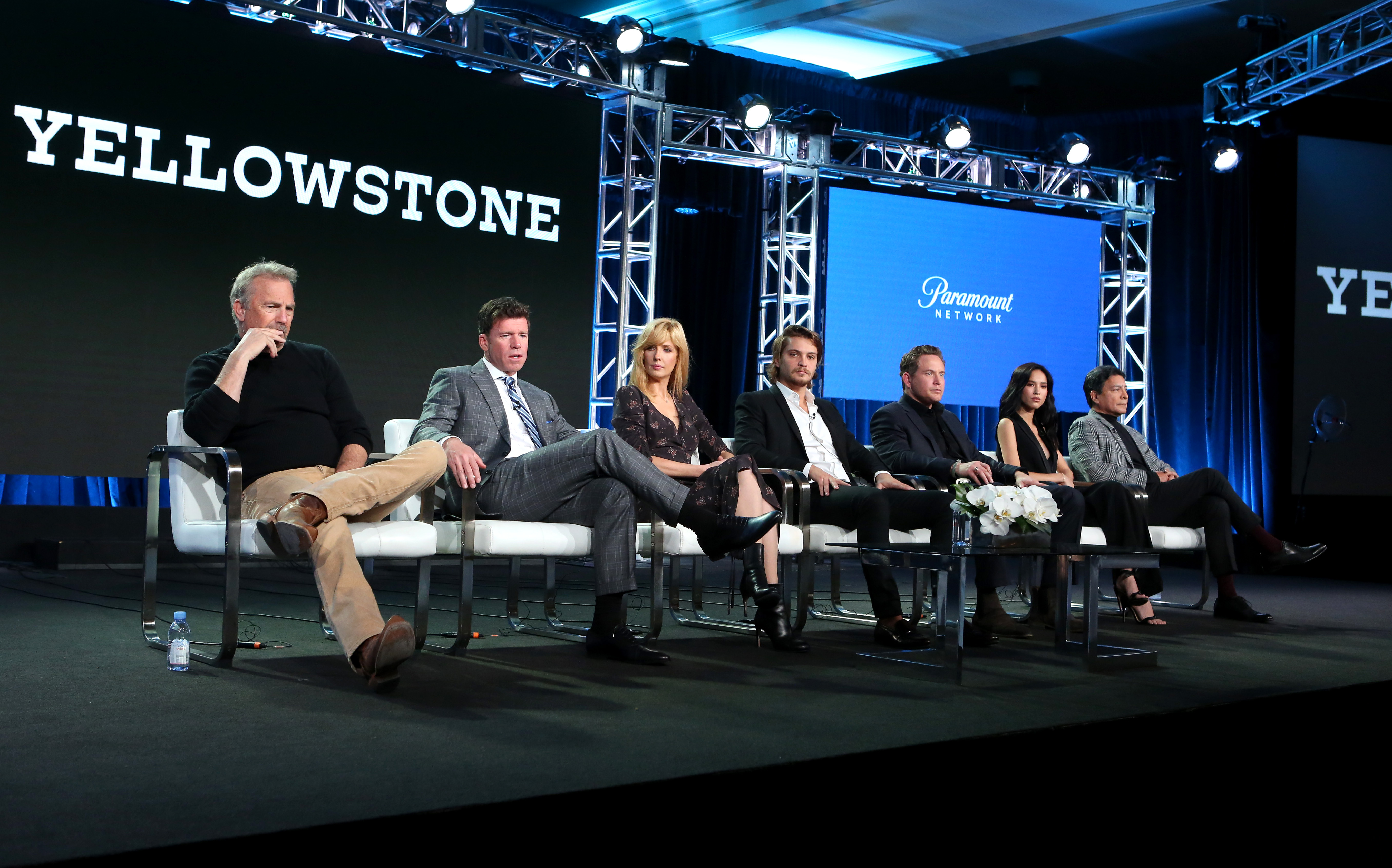 Kevin Costner, Taylor Sheridan, Kelly Reilly, Luke Grimes, Cole Hauser, Kelsey Asbille, and Gil Birmingham at the "Yellowstone" TV show panel during the TCA Winter Press Tour in Los Angeles on January 15, 2018 | Source: Getty Images