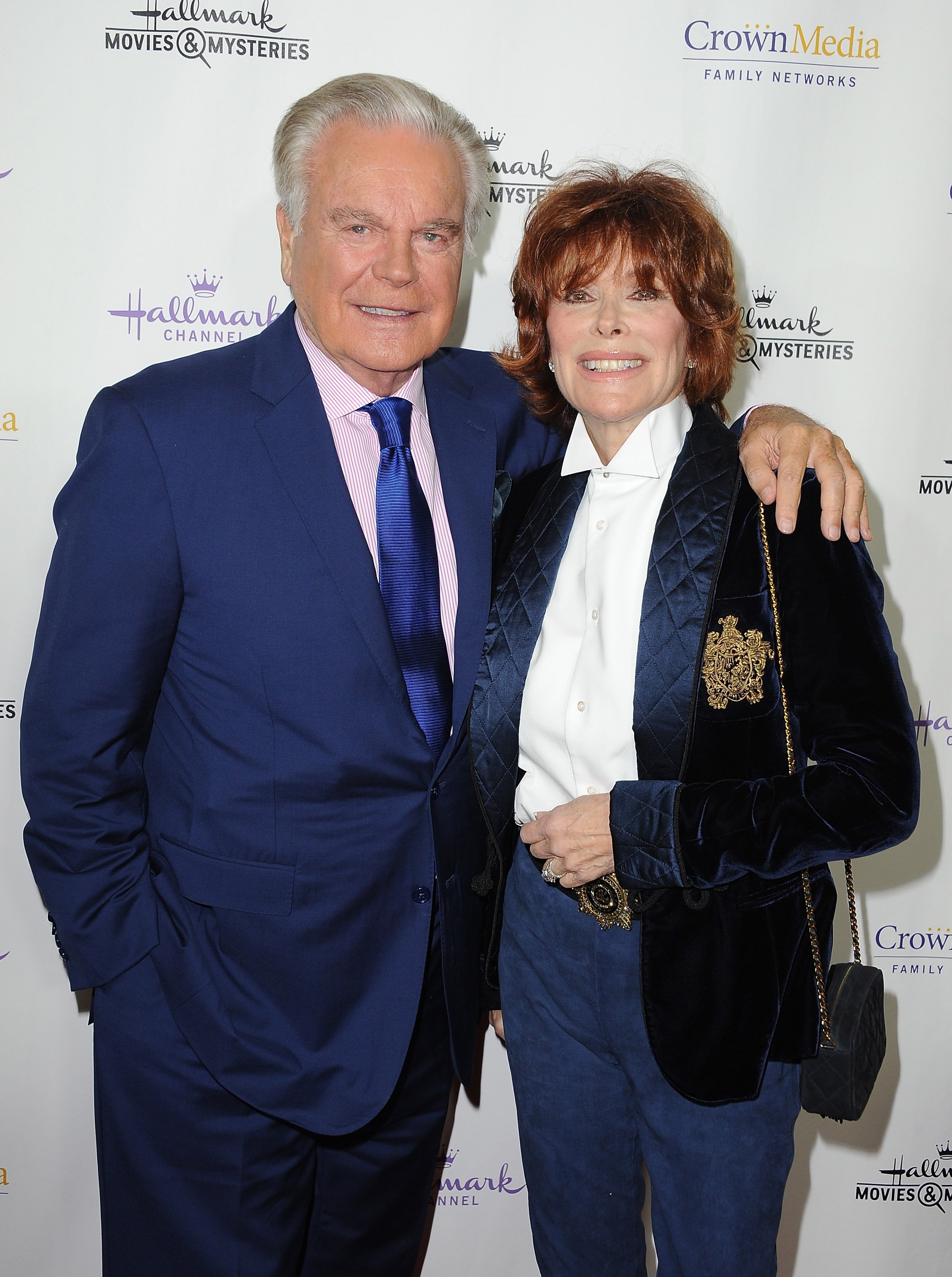 Robert Wagner and actress Jill St. John arrive at Hallmark Channel's annual holiday event premiere screening of "Northpole" at La Piazza Restaurant on November 4, 2014, in Los Angeles, California. | Source: Getty Images.