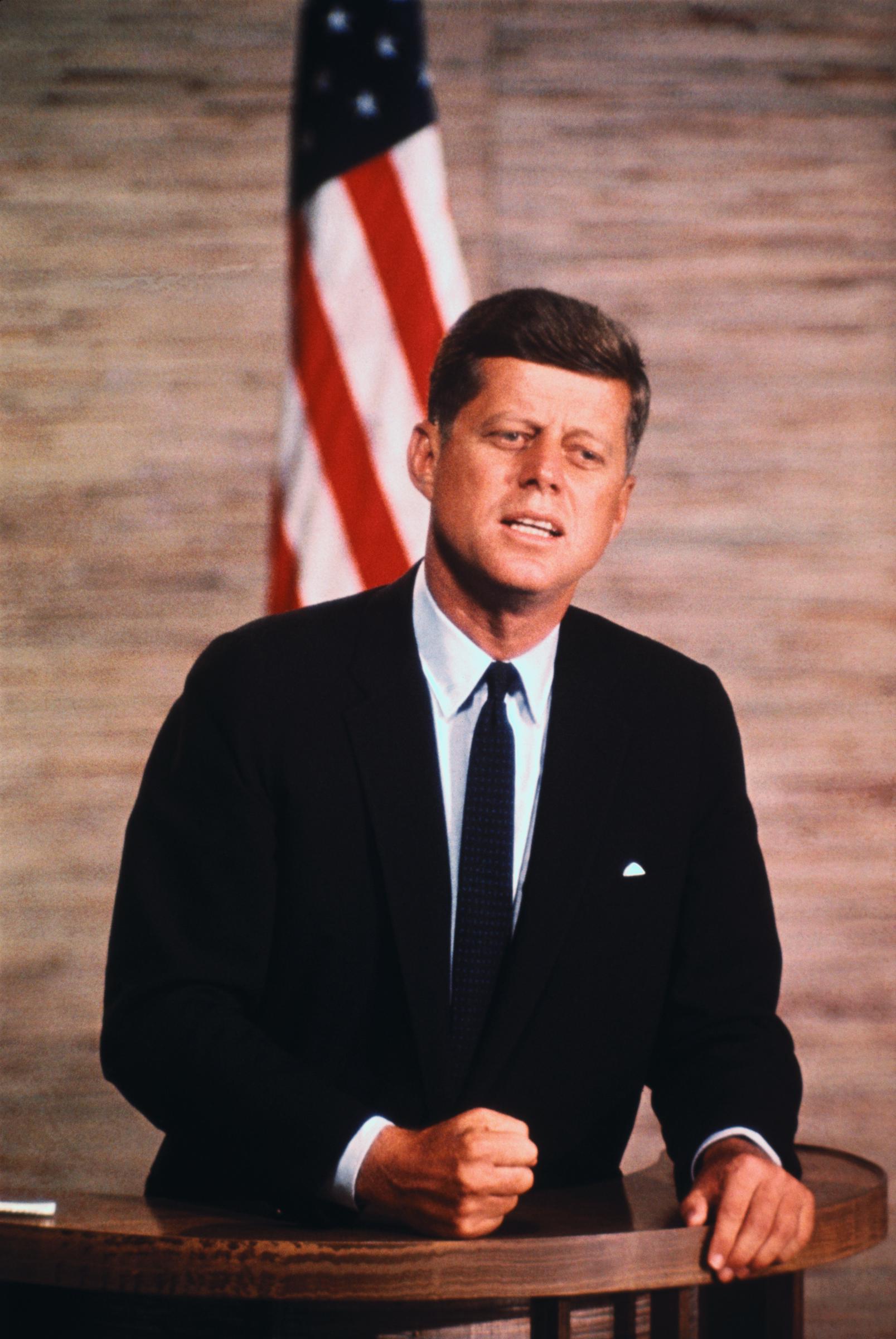 Late president John F. Kennedy speaking at a podium on October 1, 1960. | Source: Getty Images