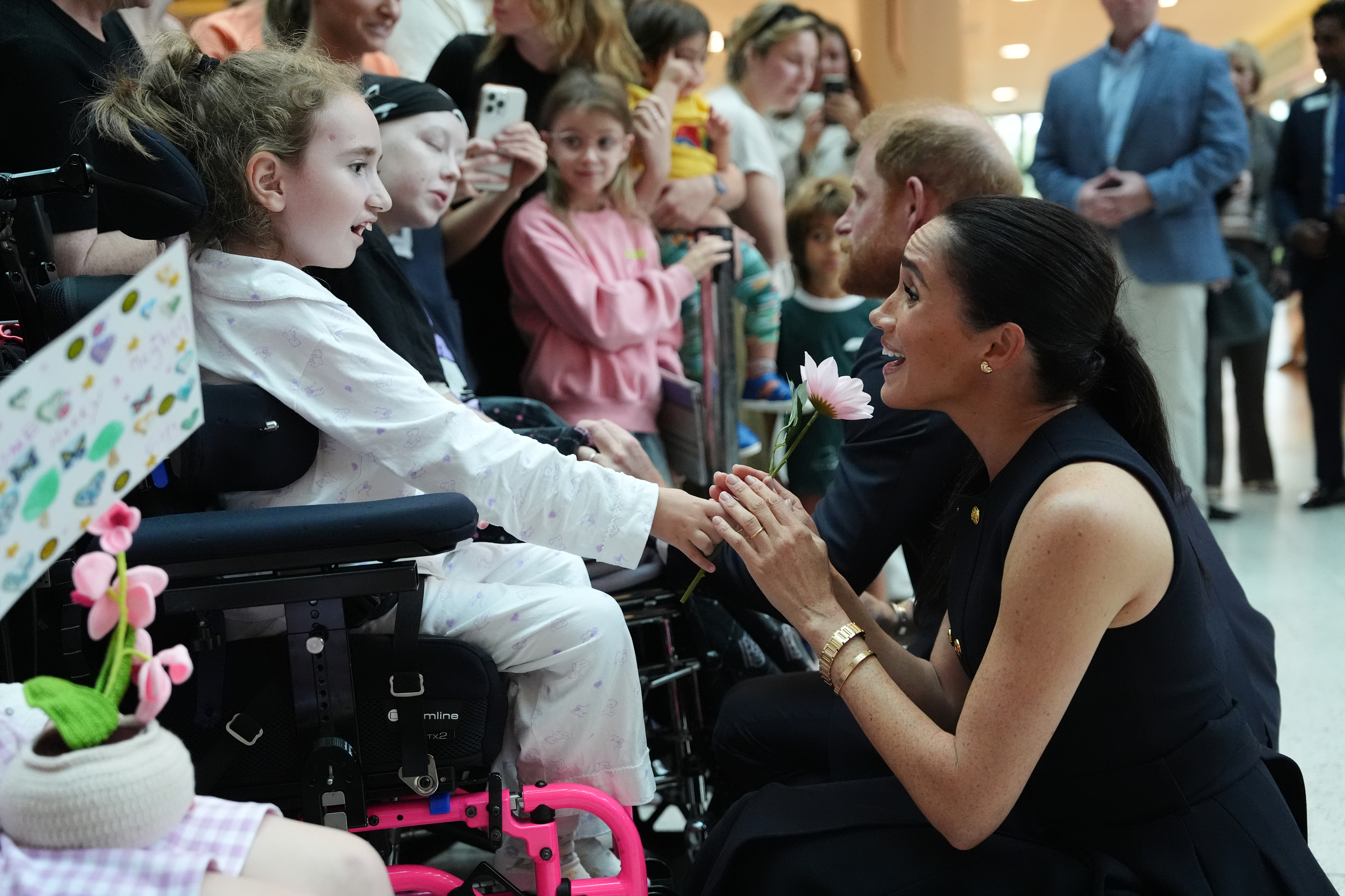 Prince Harry and Meghan Markle meet patients and their families on a visit to the Royal Children's Hospital on April 14, 2026, in Melbourne, Australia. | Source: Getty Images