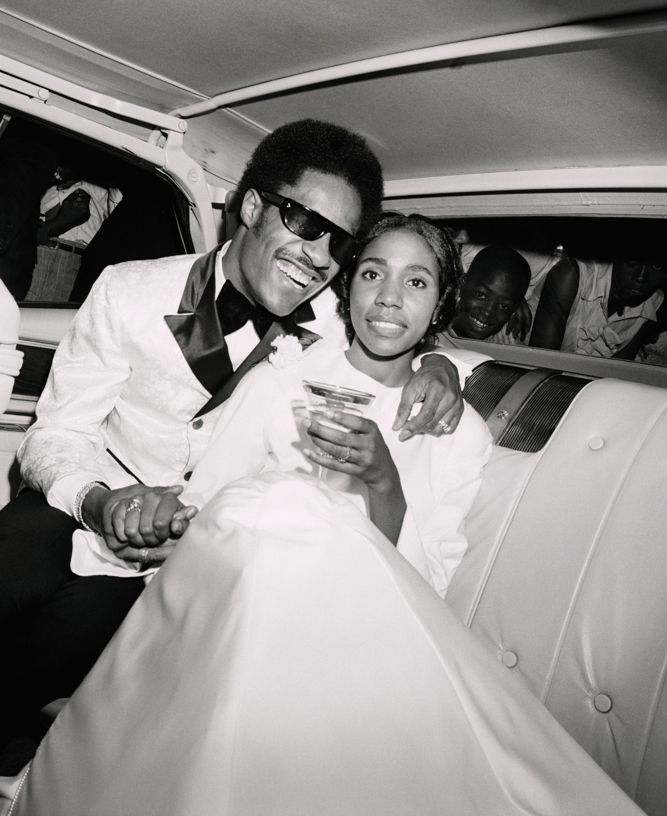 Stevie Wonder and Syreeta Wright following their wedding ceremony at the Detroit Bernette Baptist Church in 1970 | Source: Getty Images