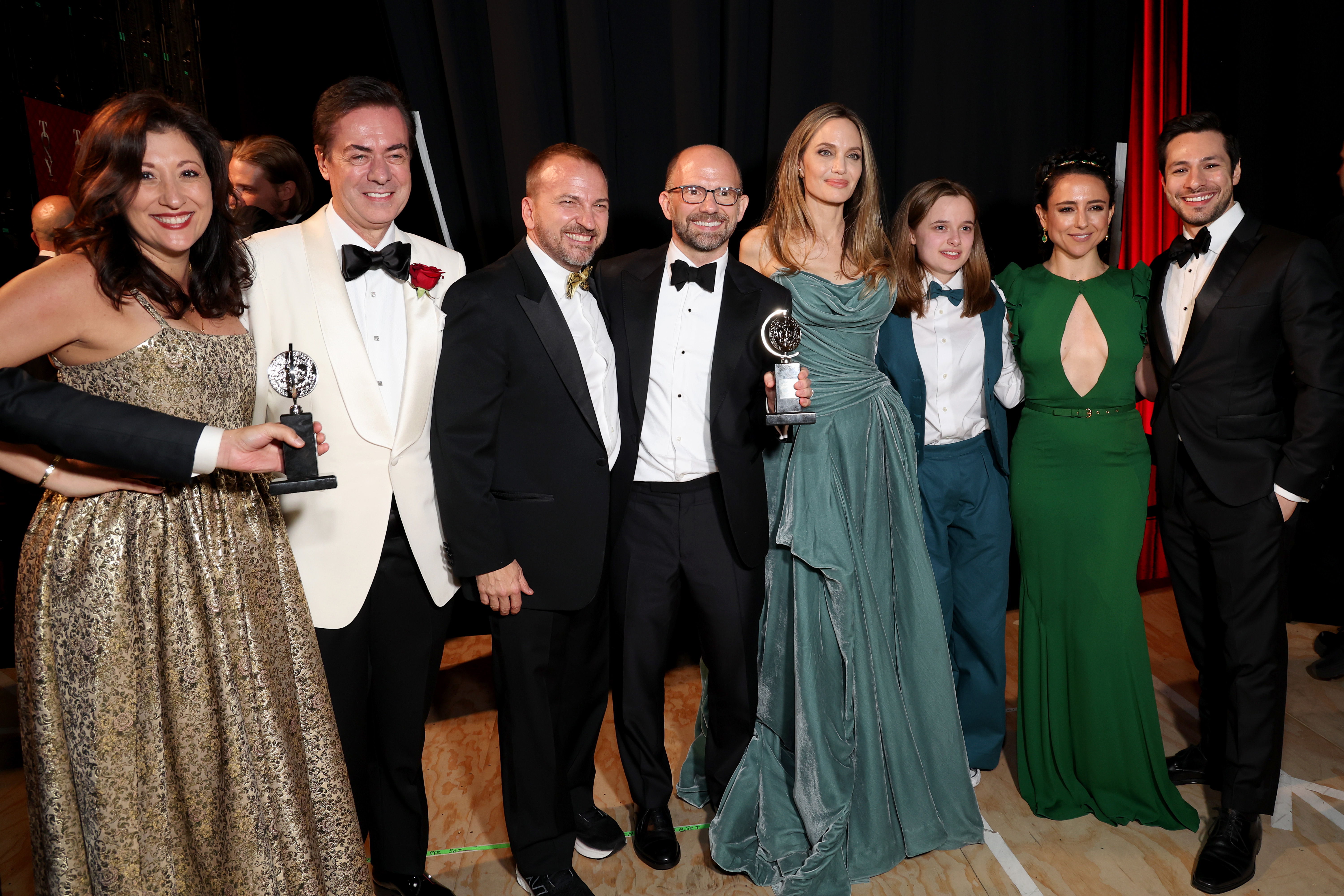 Matthew Rego, Angelina Jolie, Vivienne Jolie, Danya Taymor, Jeff Kuperman, and "The Outsiders" cast and crew at the 77th Annual Tony Awards at David H. Koch Theater at Lincoln Center on June 16, 2024, in New York City | Source: Getty Images