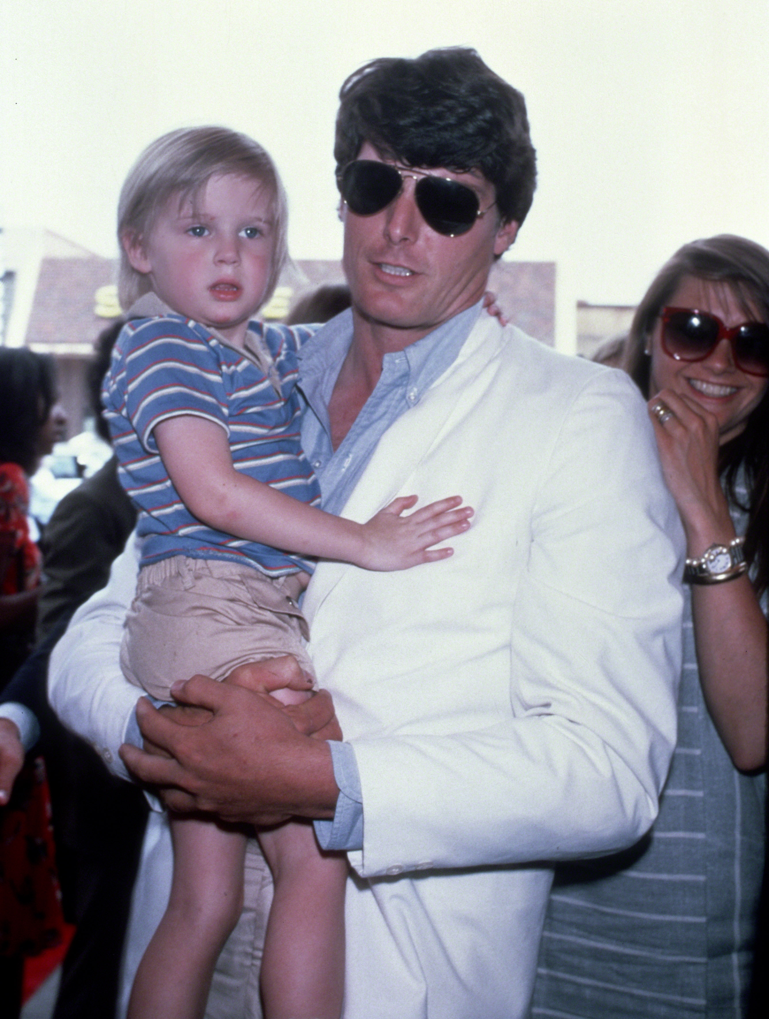 Christopher Reeve with his son Matthew Reeve and Gae Exton circa 1983 in New York City | Source: Getty Images