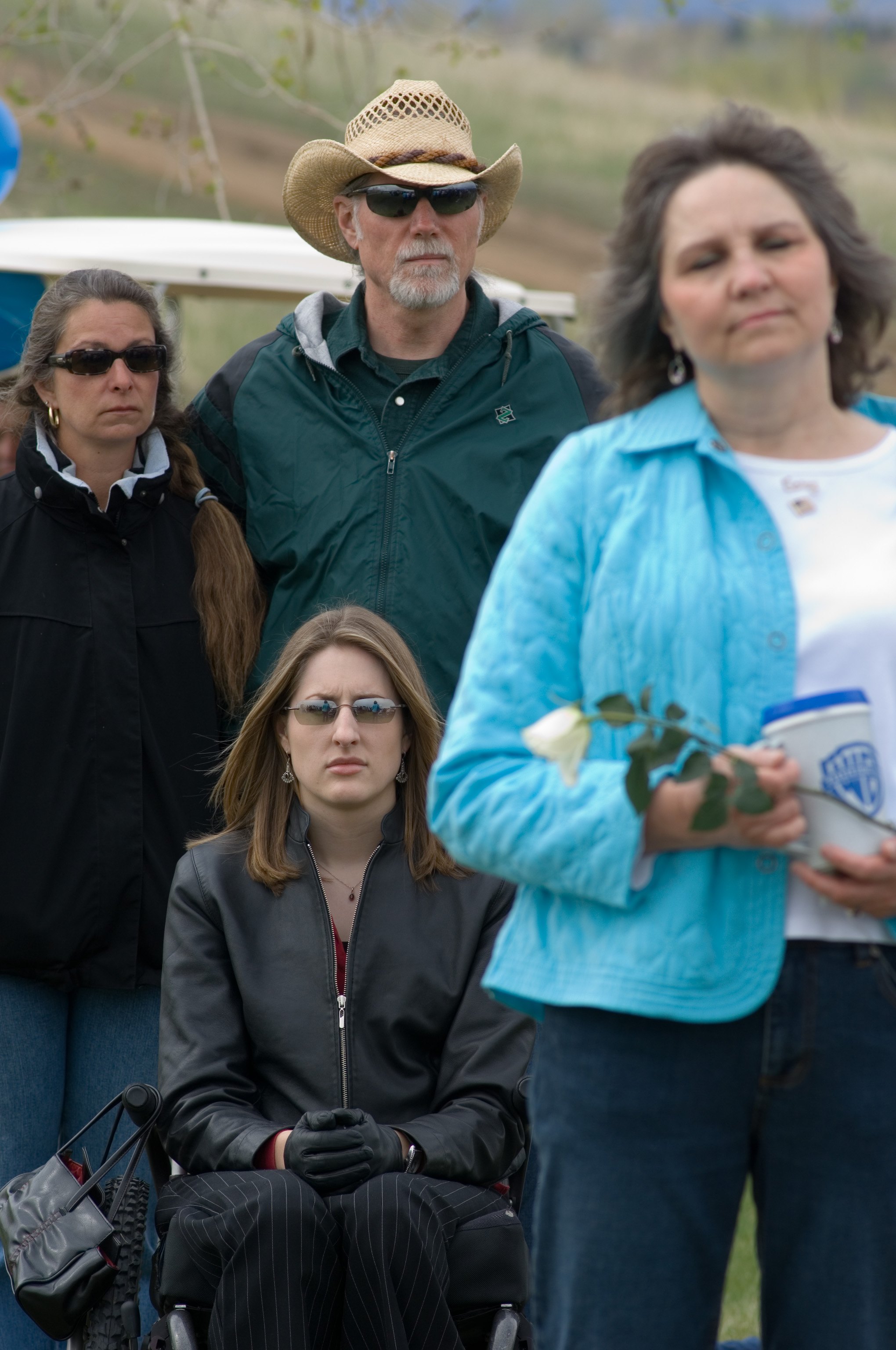 Anne Marie Hochhalter sits with her parents, Carla and Ted Hochhalter, and Patricia DePooter, mother of Corey DePooter, at a dedication ceremony at Littleton's Clement Park on April 29, 2006 | Source: Getty Images