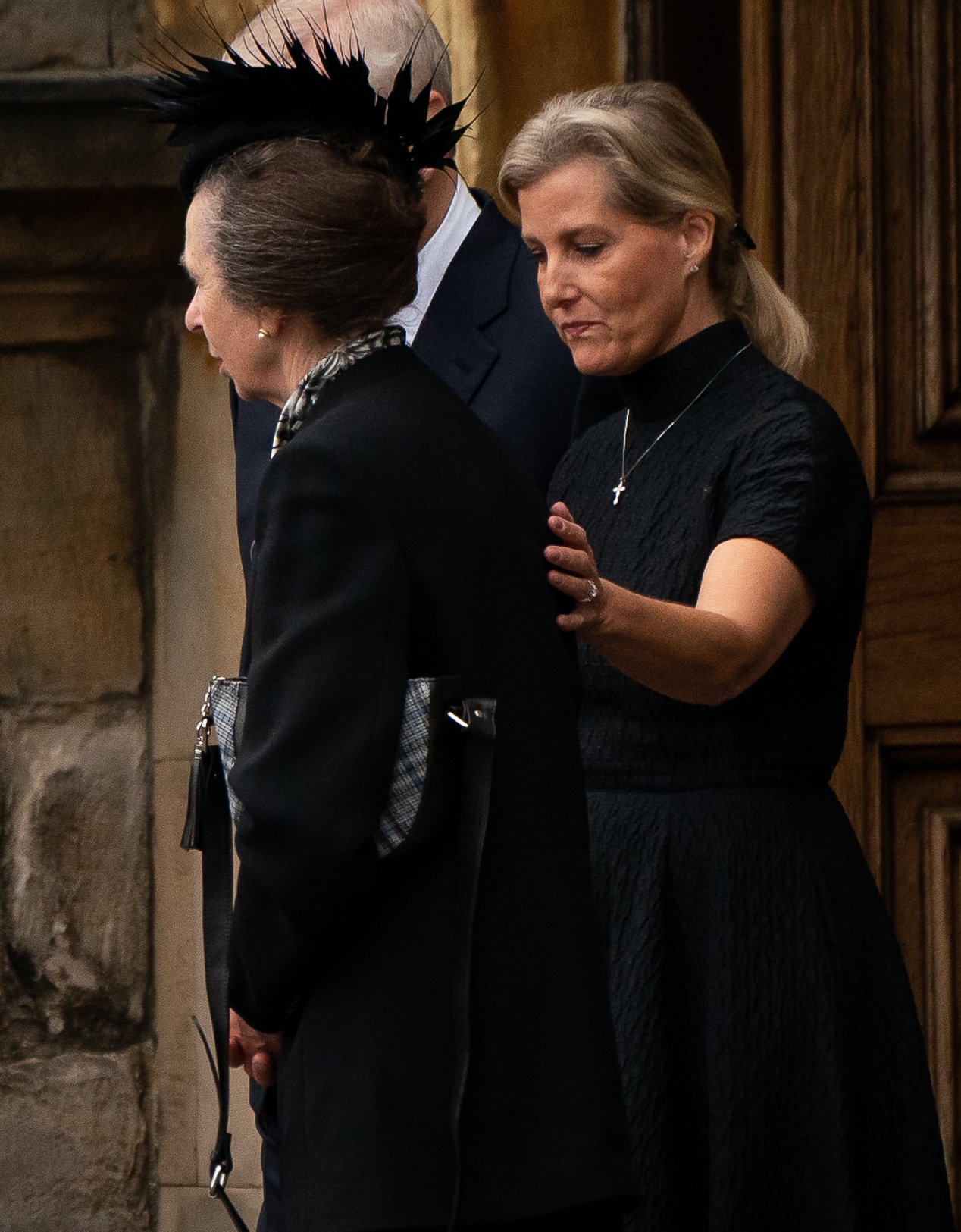 The Princess Royal is comforted by the Countess of Wessex as the coffin of Queen Elizabeth II, draped with the Royal Standard of Scotland, completes its journey from Balmoral to the Palace of Holyroodhouse in Edinburgh. Sunday September 11, 2022 | Source: Getty Images 