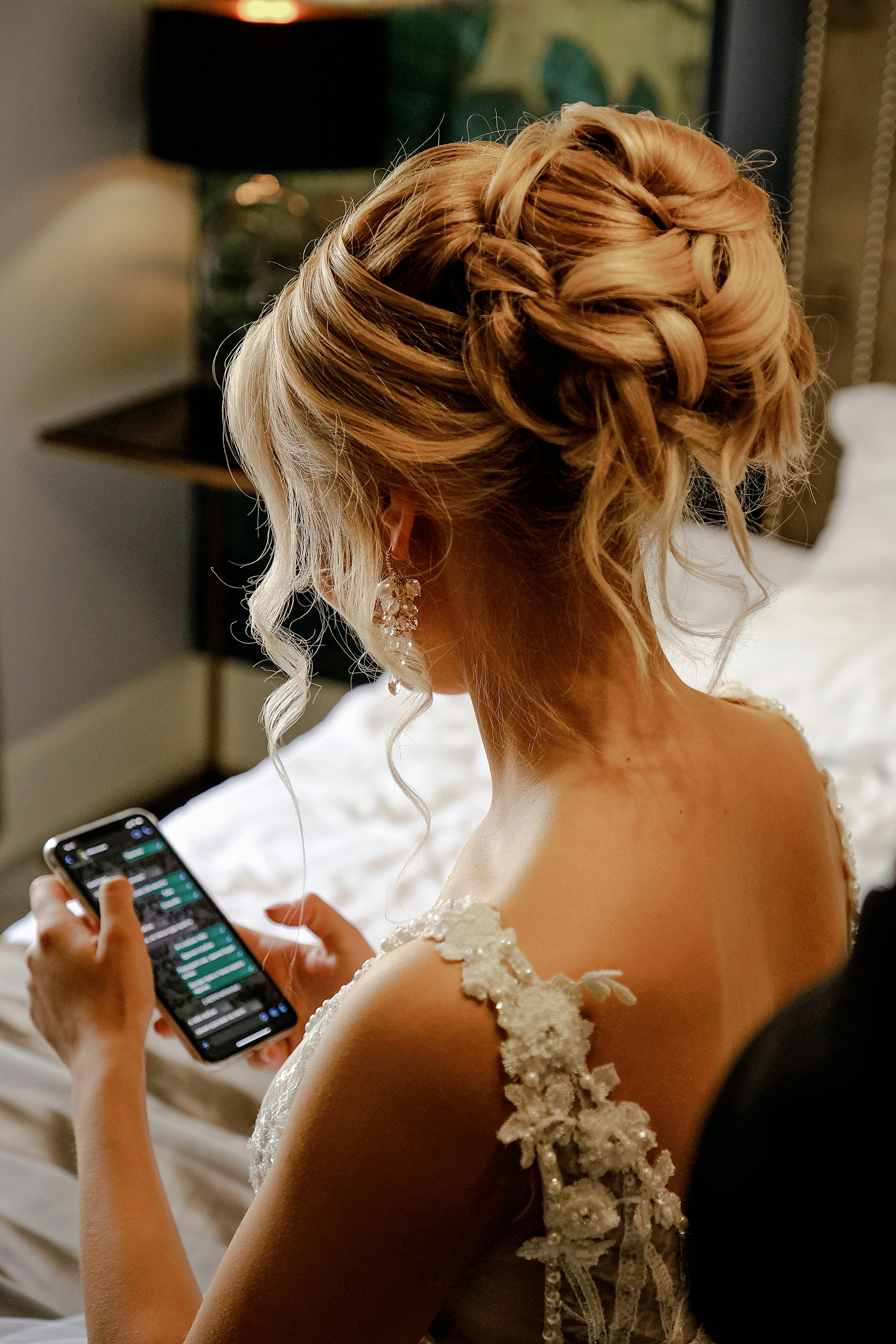 A bride using her phone | Source: Pexels