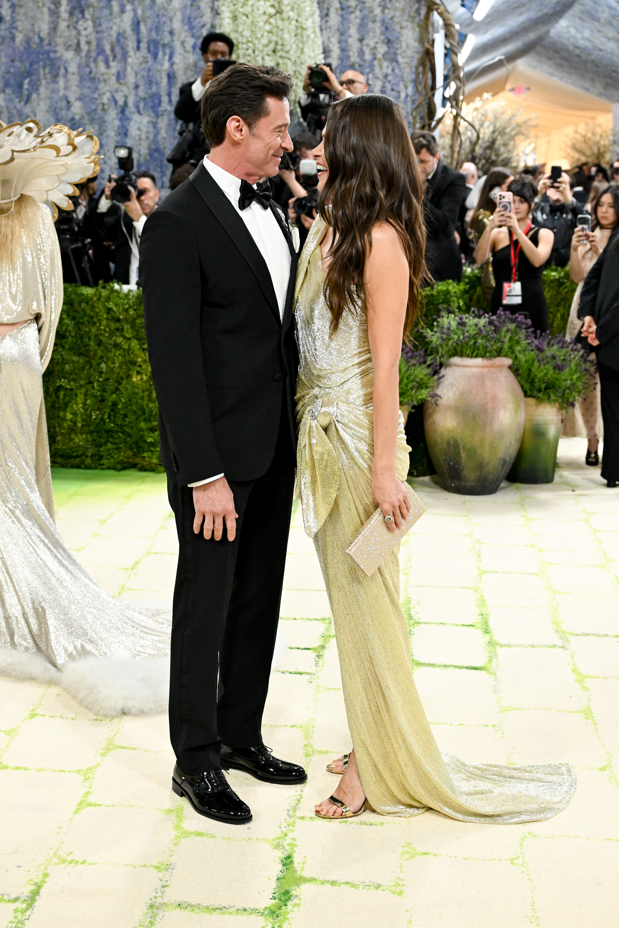 Hugh Jackman and Sutton Foster look at each other at the Met Gala Celebrating "Costume Art" at Metropolitan Museum of Art in New York City on May 4, 2026. | Source: Getty Images