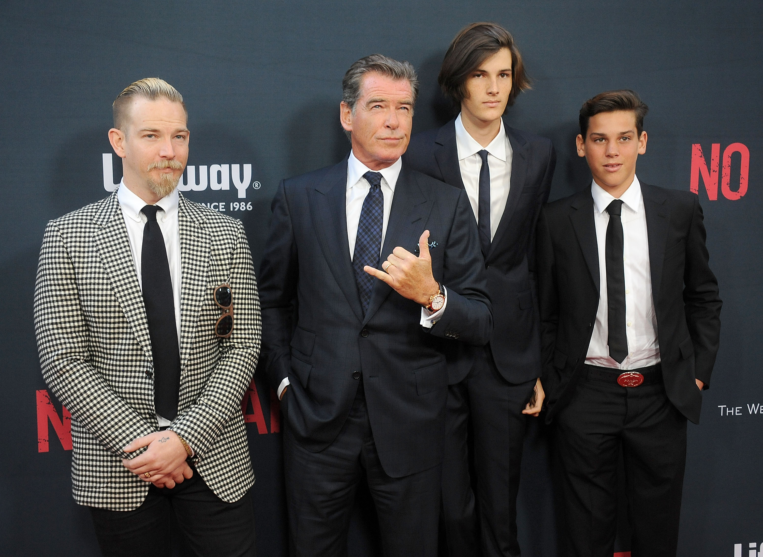 Sean Brosnan, Pierce Brosnan, Dylan Brosnan and Paris Brosnan arrive at the premiere of The Weinstein Company's "No Escape" at Regal Cinemas L.A. Live on August 17, 2015  | Source: Getty Images