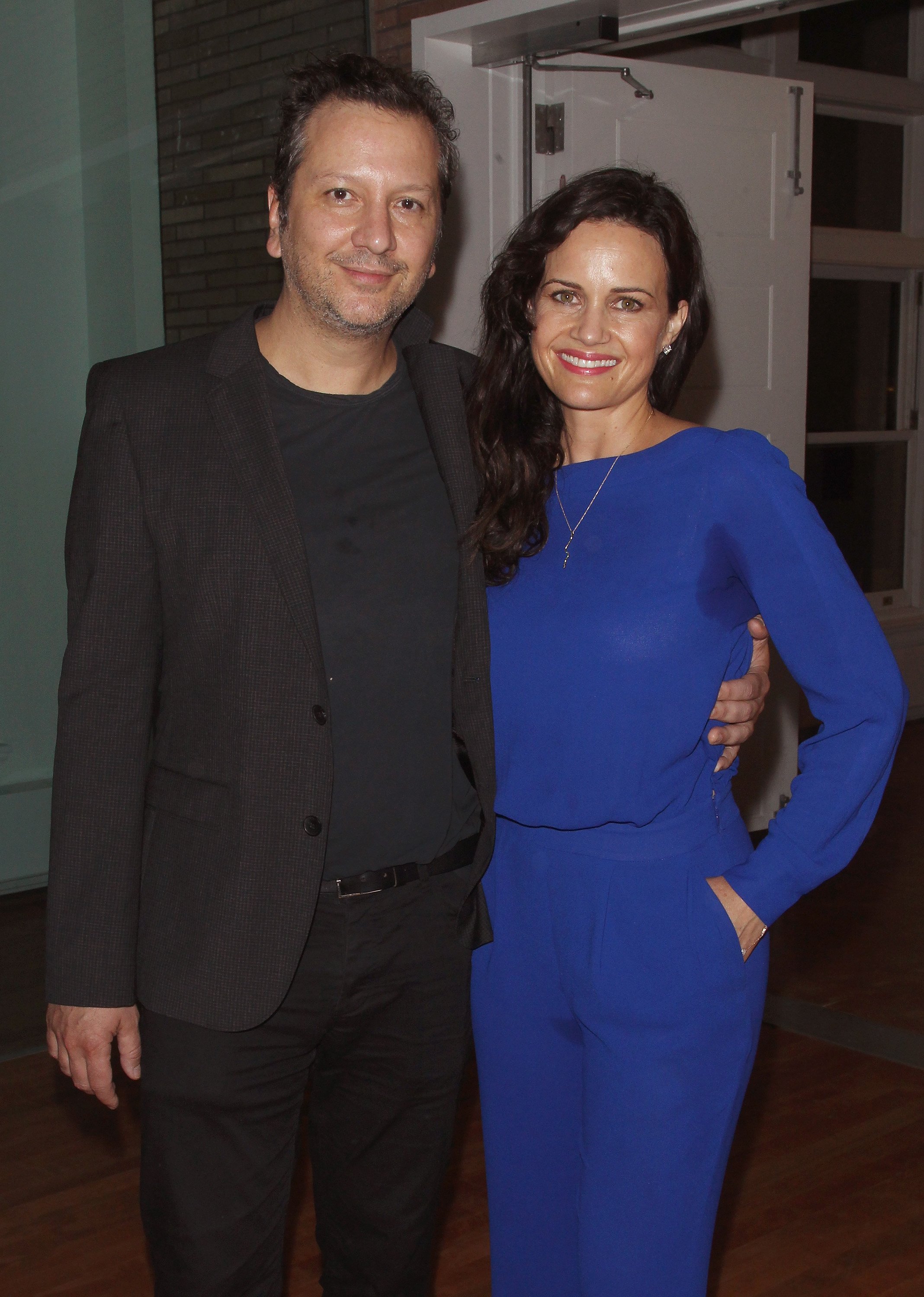 Sebastian Gutierrez and Carla Gugino at the after-party for Sony Pictures Classics' "Whiplash" at Carnegie Hall on September 29, 2014, in New York City. | Source: Getty Images