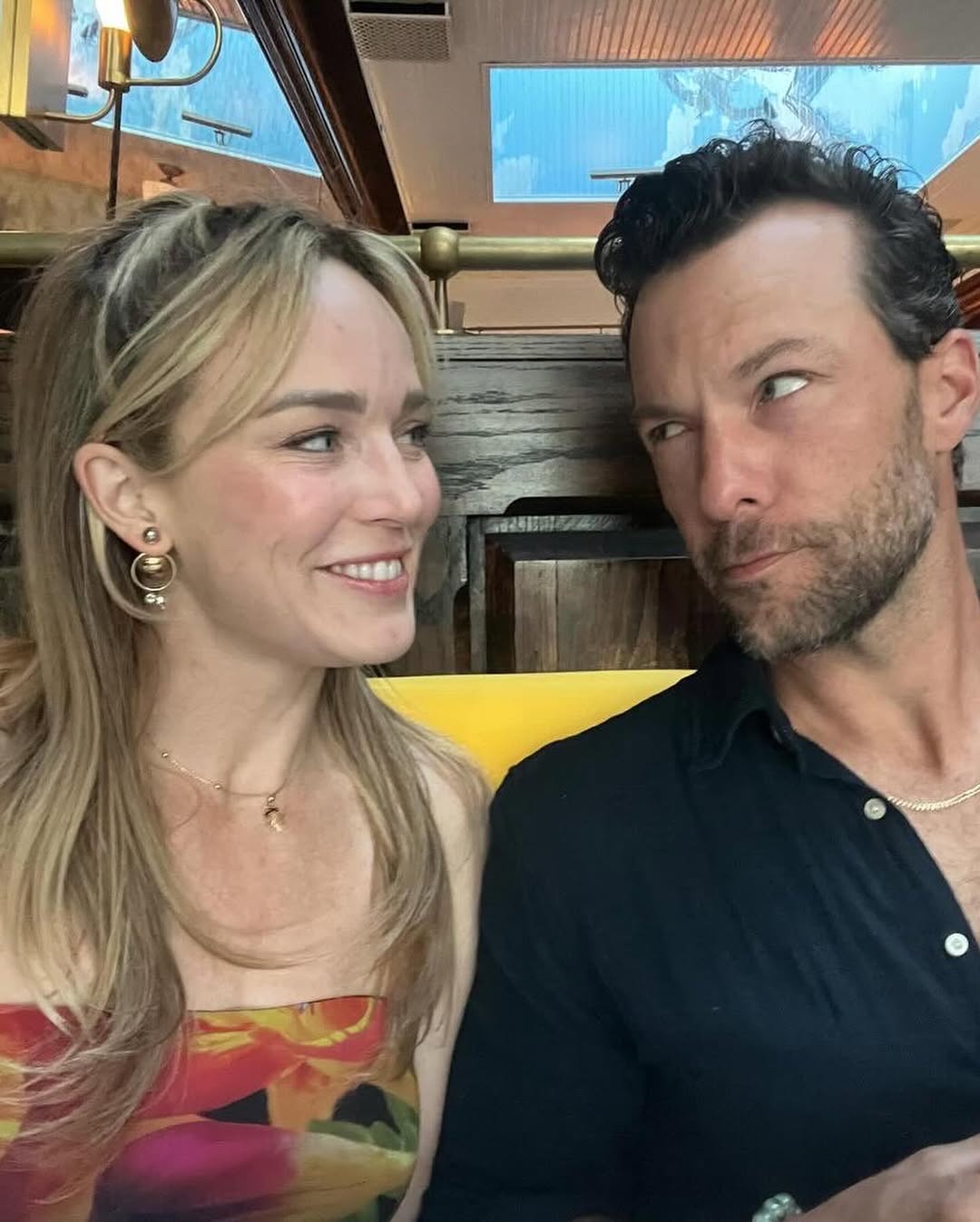 Caity Lotz and Kyle Schmid from a post dated December 31, 2024. | Source: Instagram/iamkyleschmid
