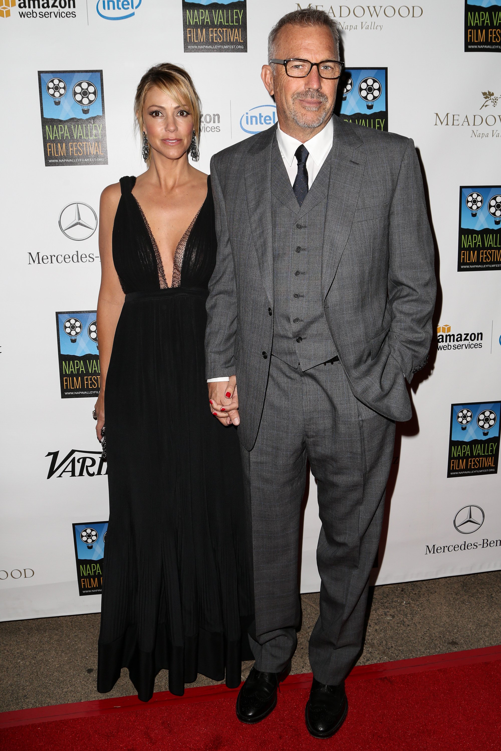 Kevin Costner and wife Christine Baumgartner attend Mercedes-Benz arrivals at Napa Valley Film Festival celebrity tribute night on November 14, 2014, in Napa, California. | Source: Getty Images