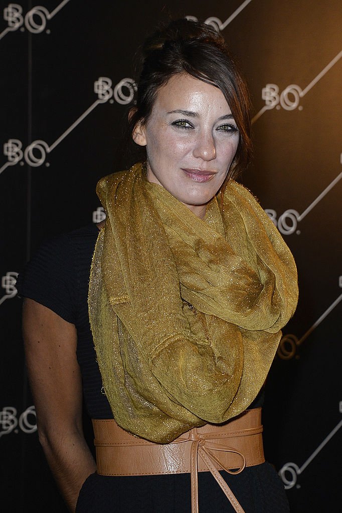 Emma Colberti arrive à l'ouverture du restaurant "BO" à La Cité du cinéma le 10 octobre 2013 à Saint-Denis, France. | Photo : Images