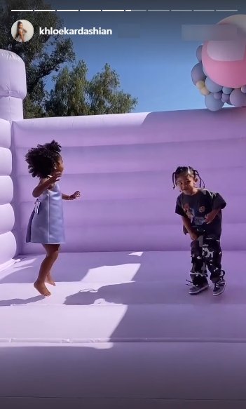 Screenshot of video clip showing True Thompson and Stormi Webster at True's 3rd birthday party. | Source: Instagram/khloekardashian