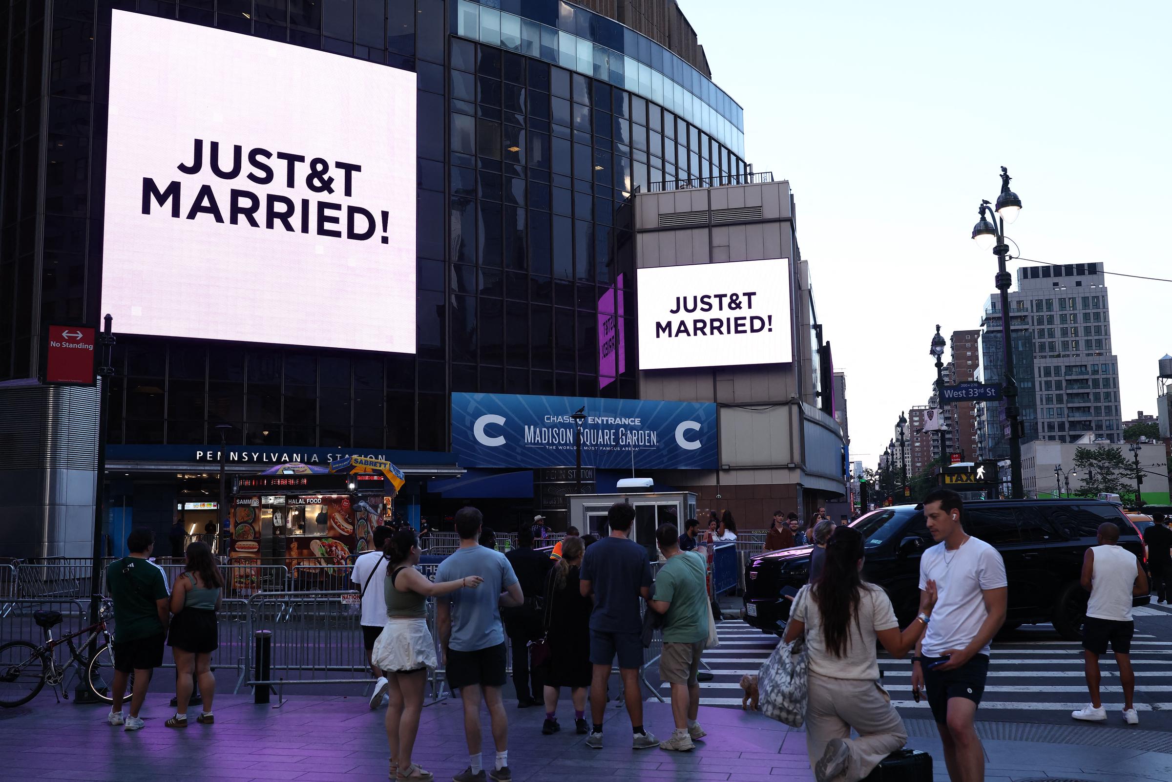 Madison Square Garden displayed "JUST&T MARRIED!" on its exterior screens after Taylor Swift and Travis Kelce's wedding ceremony. The private celebration was held inside the iconic New York venue. | Source: Getty Images