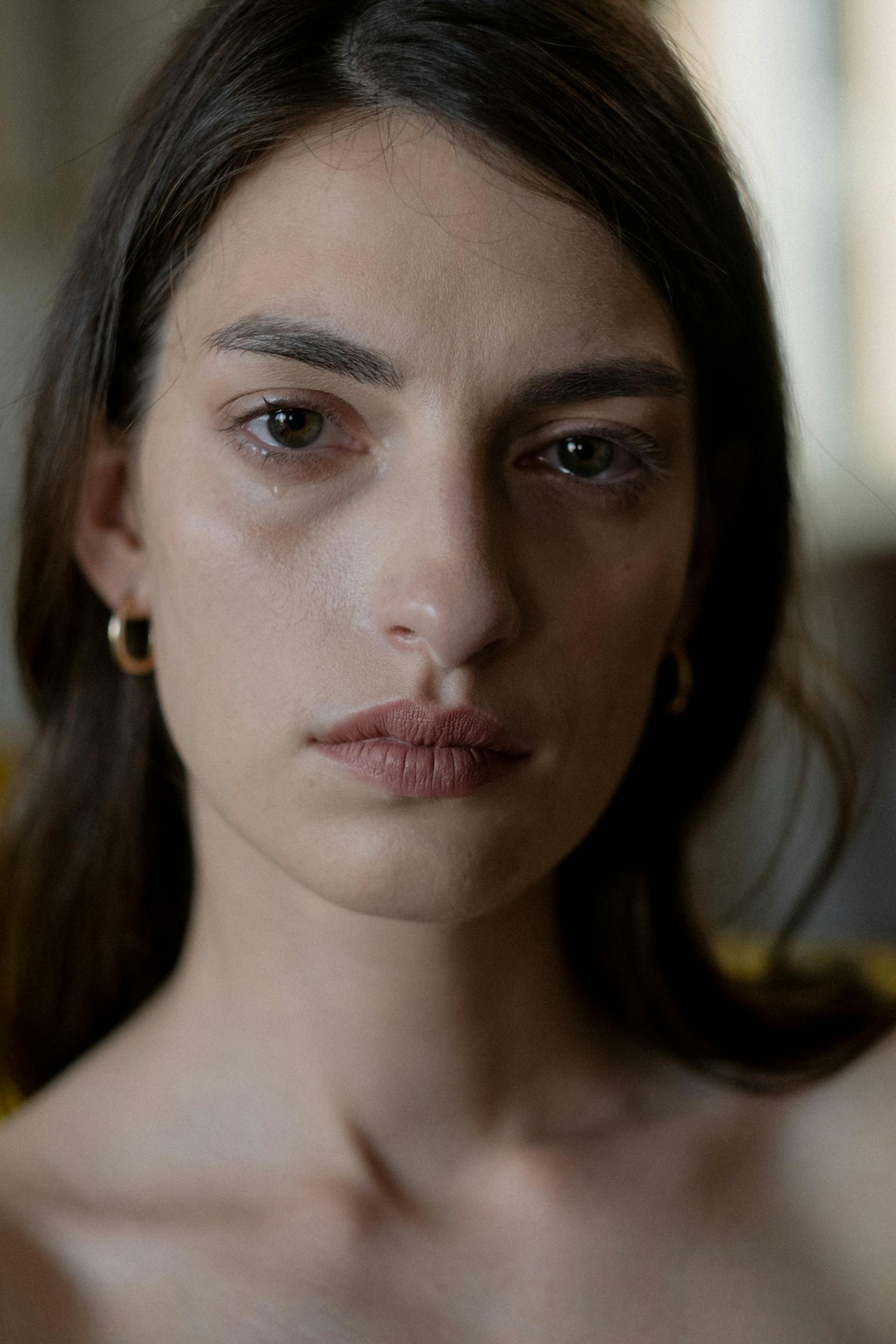 A woman with tears in her eyes | Source: Pexels
