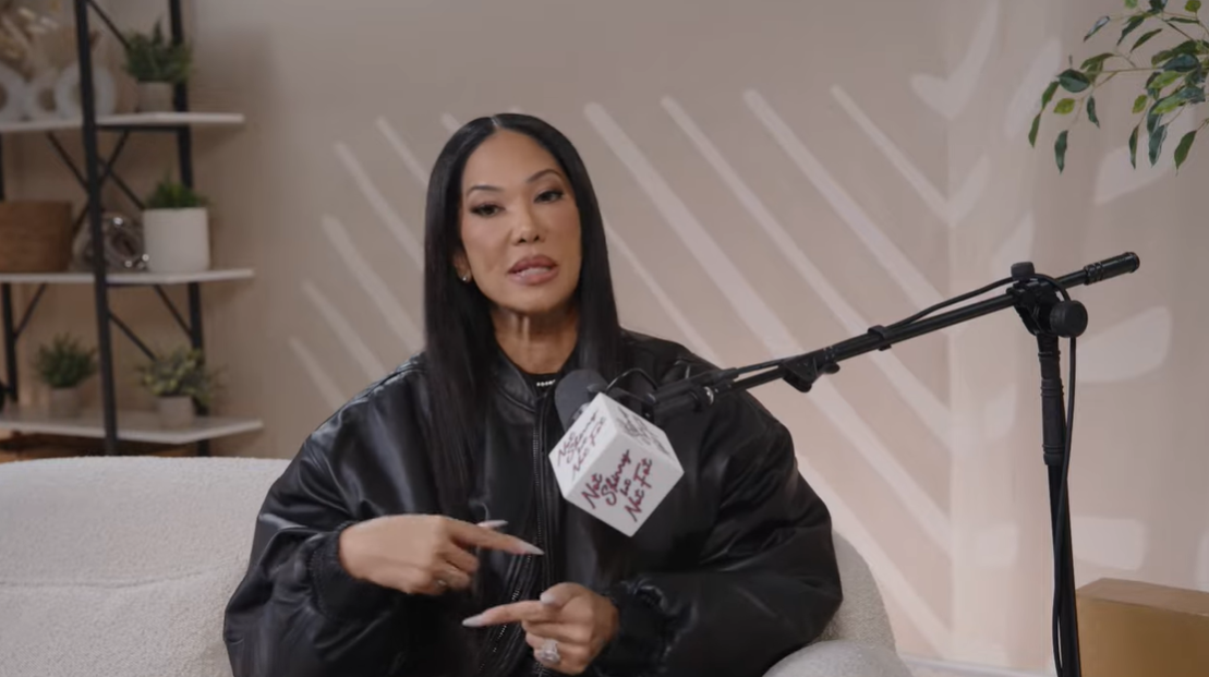 Kimora Lee Simmons uses her hands to emphasize just how quickly the situation escalated in the public eye | Source: YouTube/notskinnybutnotfat