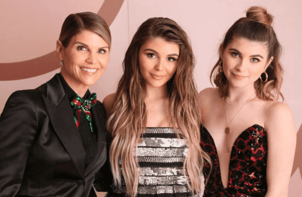 Lori Loughlin and her daughters, Olivia Jade Giannulli and Isabella Rose Giannulli pose for the launch of the "Olivia Jade X Sephora Collection," Sephora online palette collaboration, on December 14, 2018, in West Hollywood, California | Source: Gabriel Olsen/Getty Images for Sephora Collection