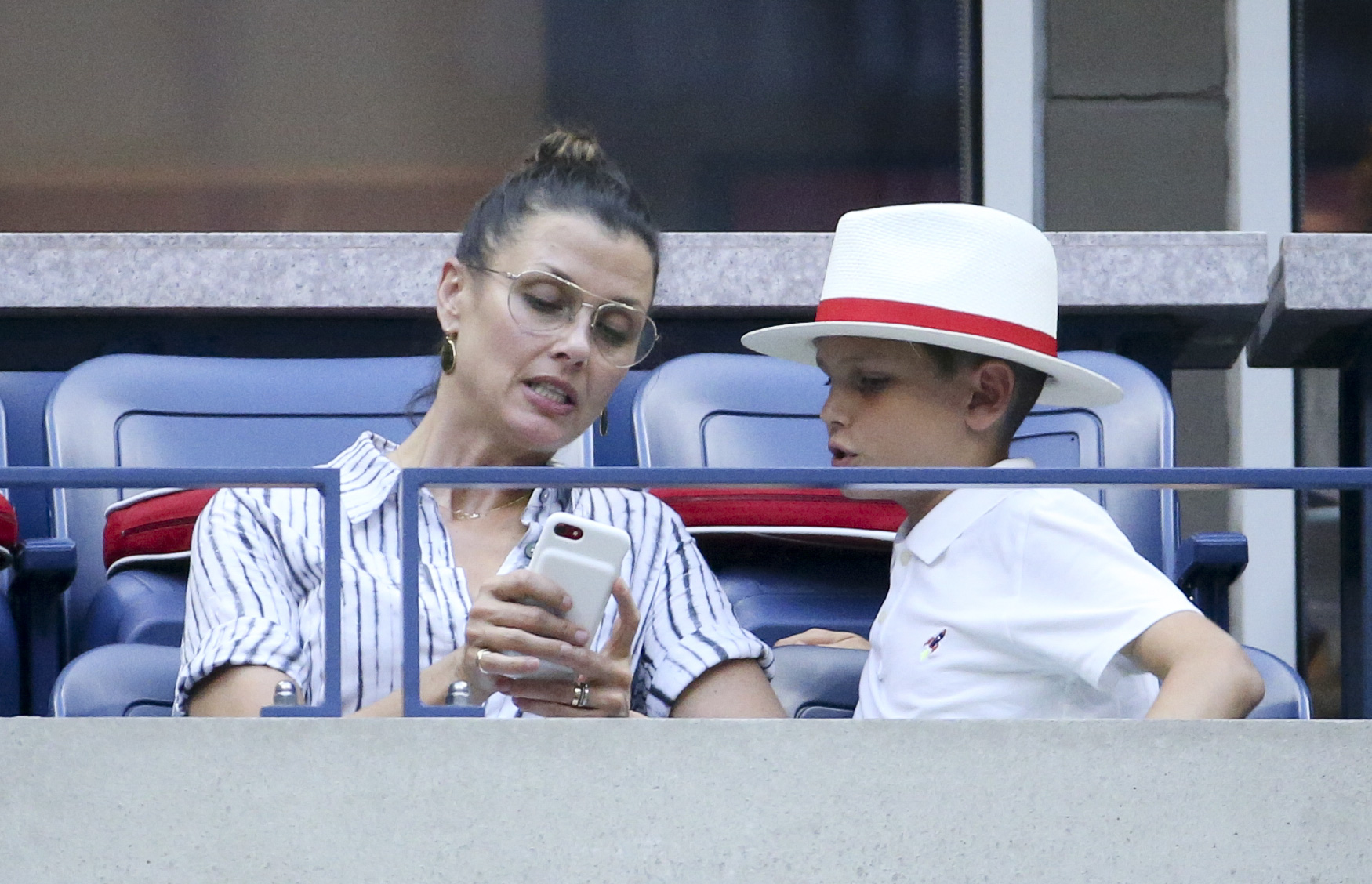Bridget Moynahan with her son John Edward Thomas Moynahan at the 2018 tennis US Open on August 29, 2018 in Queens, New York City | Source: Getty Images