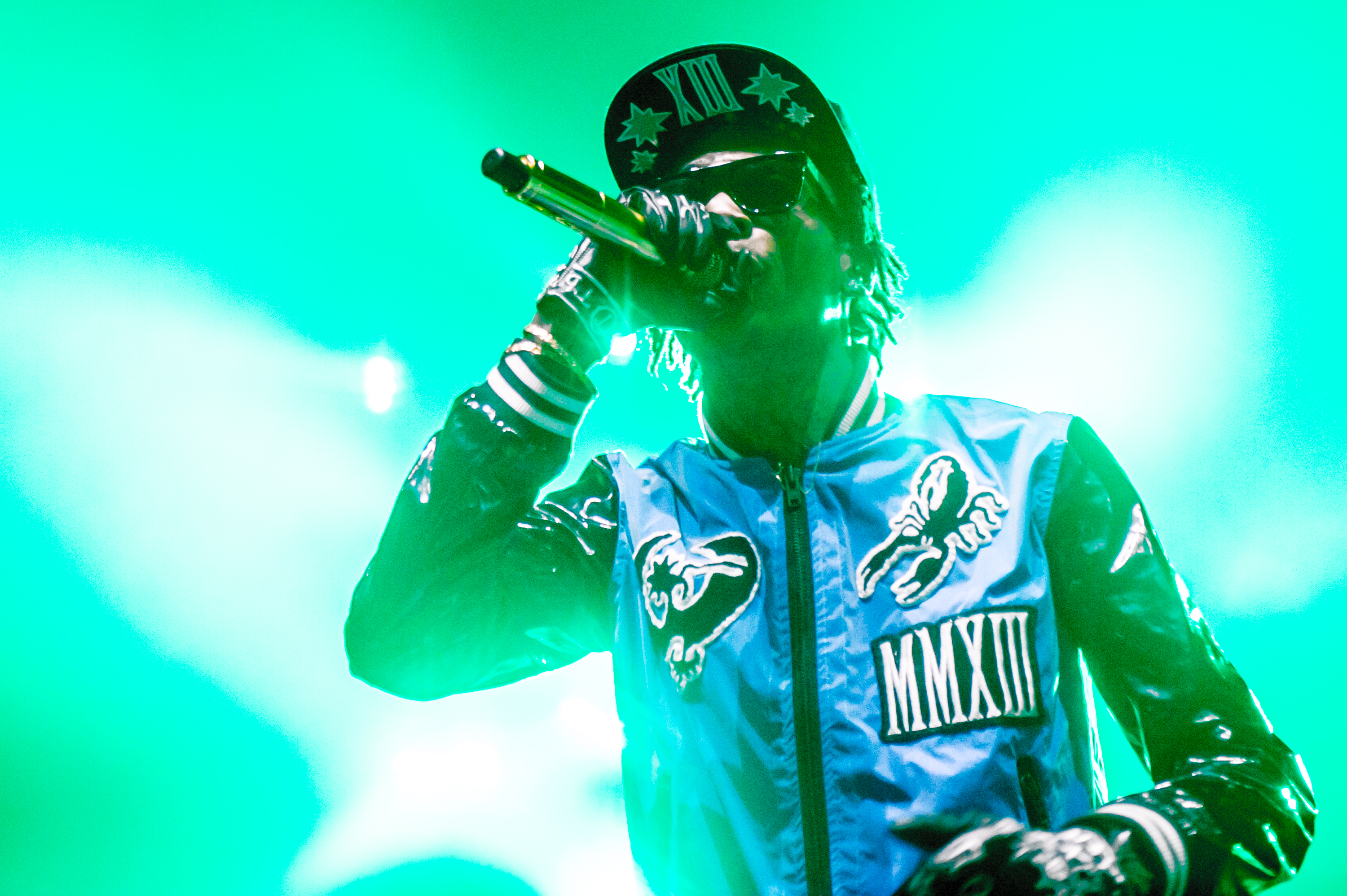Wiz Khalifa onstage at Brixton Academy on September 26, 2013, in London, England. | Source: Getty Images