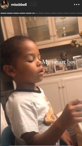 Nick Cannon's son, Golden, pictured playing a game on his tablet. | Photo: Instagram/missbell