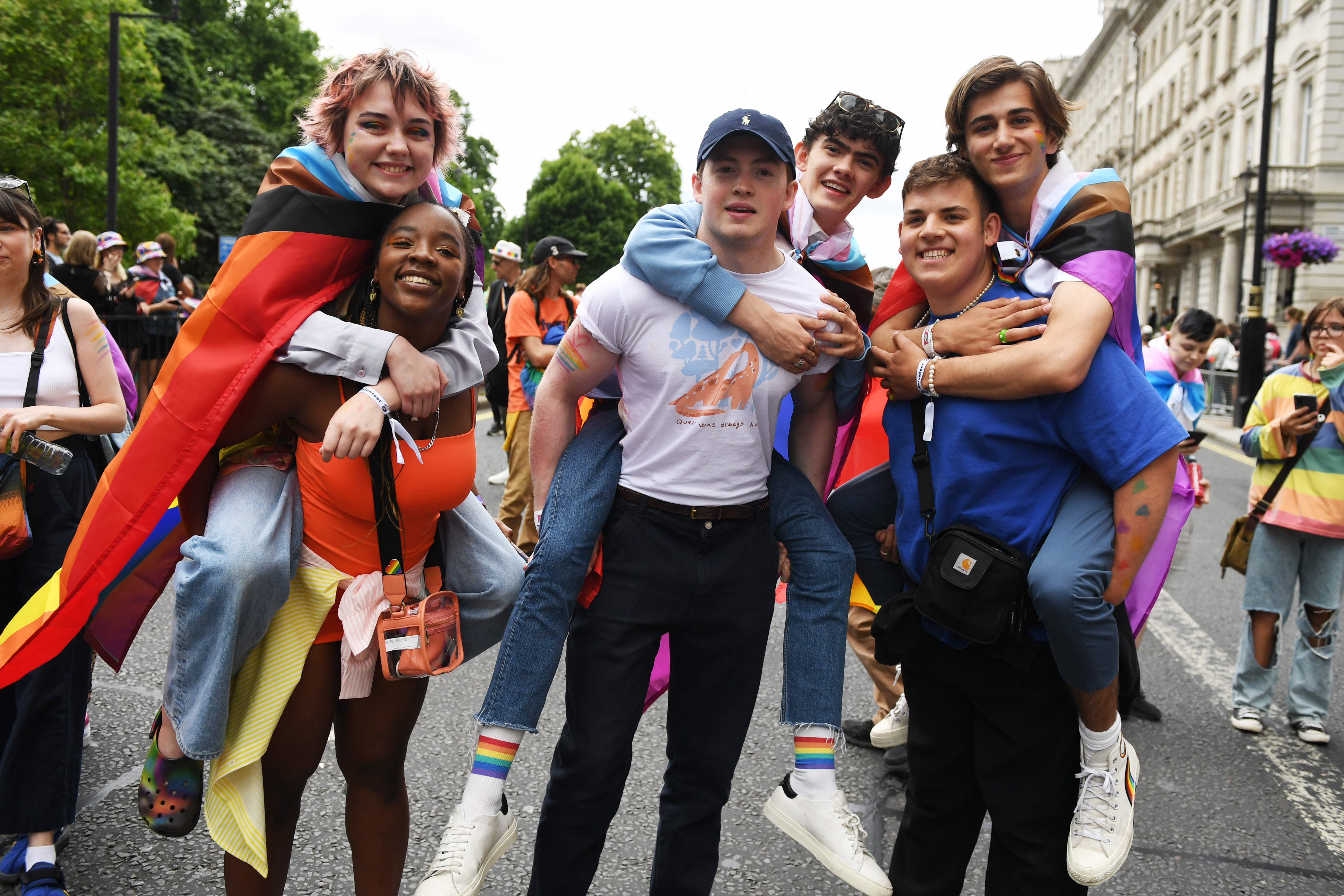The cast of "Heartstopper" (L-R) Kizzy Edgell, Corinna Brown, Kit Connor, Joe Locke, Tobie Donovan and Sebastian Croft attend Pride in London 2022: The 50th Anniversary - Parade on July 02, 2022 in London, England. | Source: Getty Images