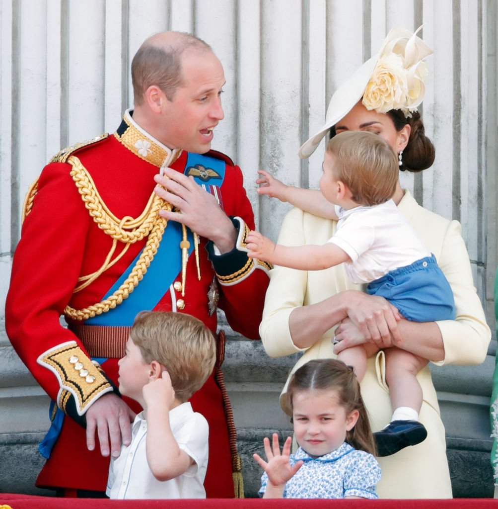 Prince William, Duke of Cambridge, Catherine, Duchess of Cambridge, Prince Louis of Cambridge, Prince George of Cambridge and Princess Charlotte of Cambridge on the balcony of Buckingham Palace during Trooping The Colour, the Queen's annual birthday parade | Photo: Getty Images