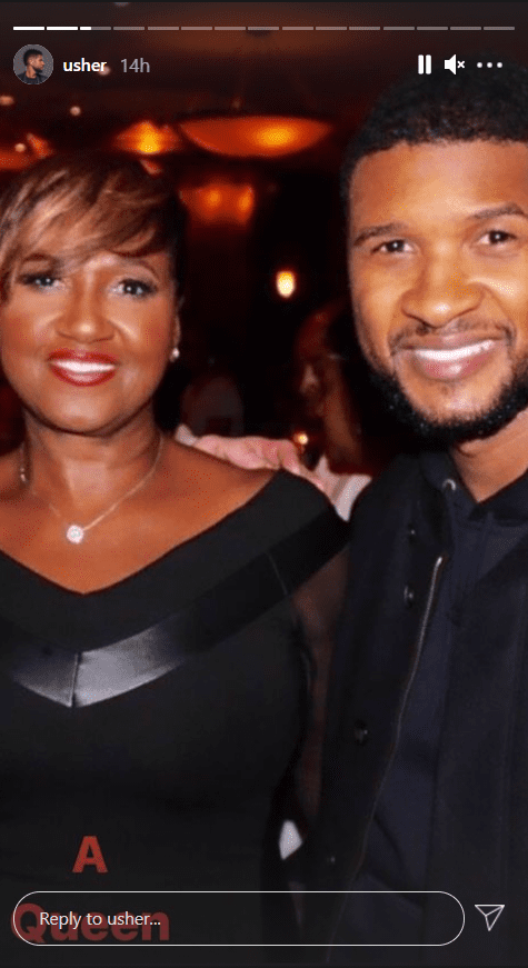 Usher Raymond and his mom posing for a photograph | Photo: Instagram/usher