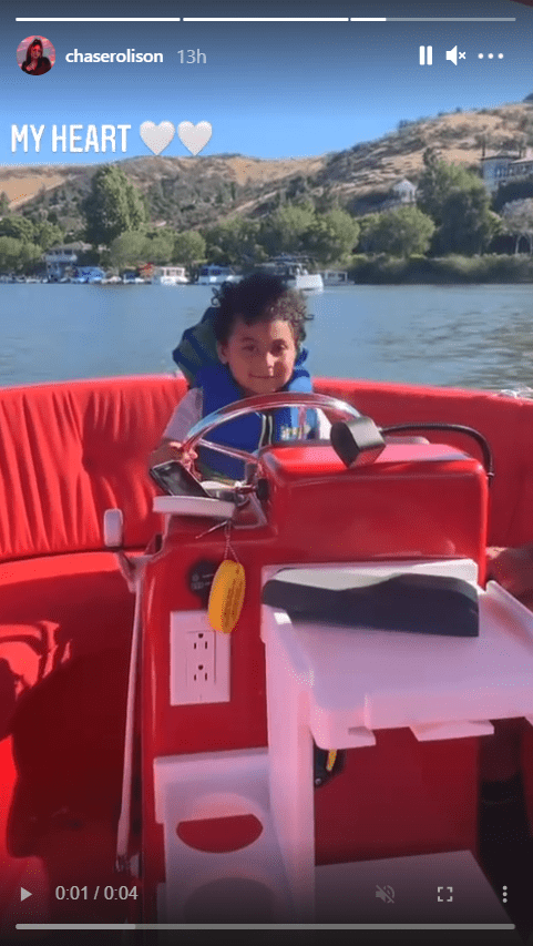 TLC singer Tionne "T-Boz" Watkin's son Chance seen riding on a boat while wearing a life jacket | Photo: Instagram/chaserolison