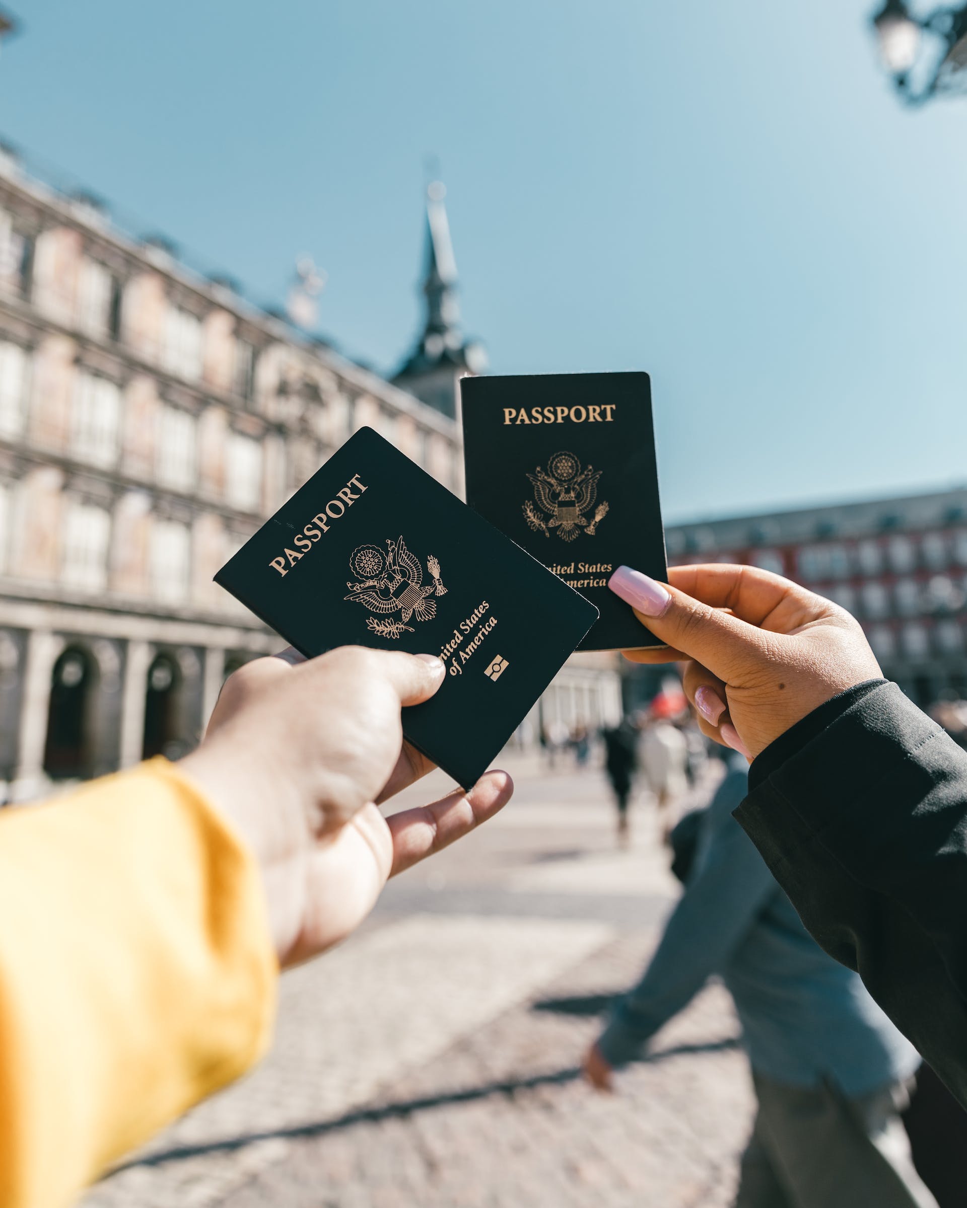 People holding passports | Source: Pexels