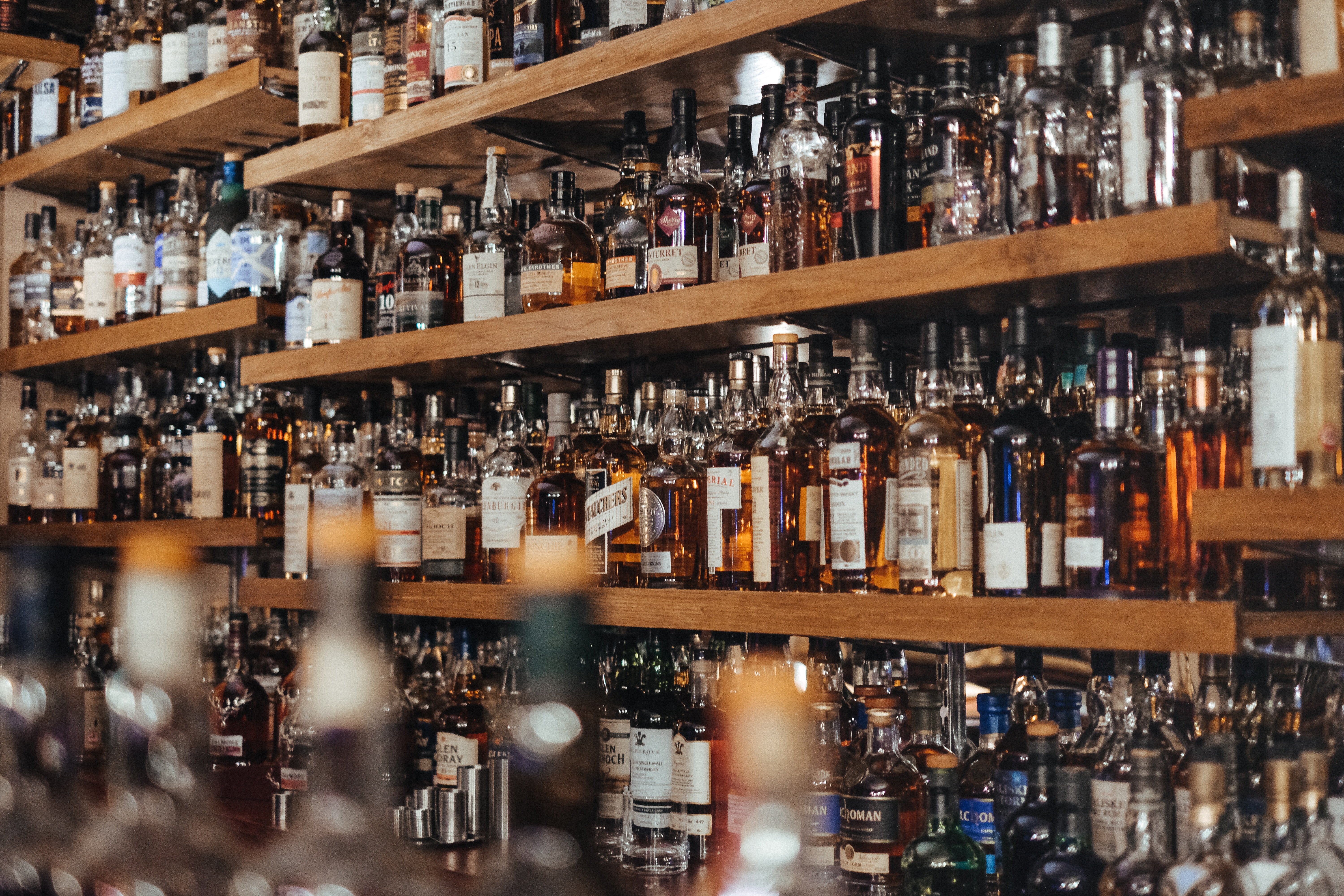 Bottles at the bar. | Source: Unsplash