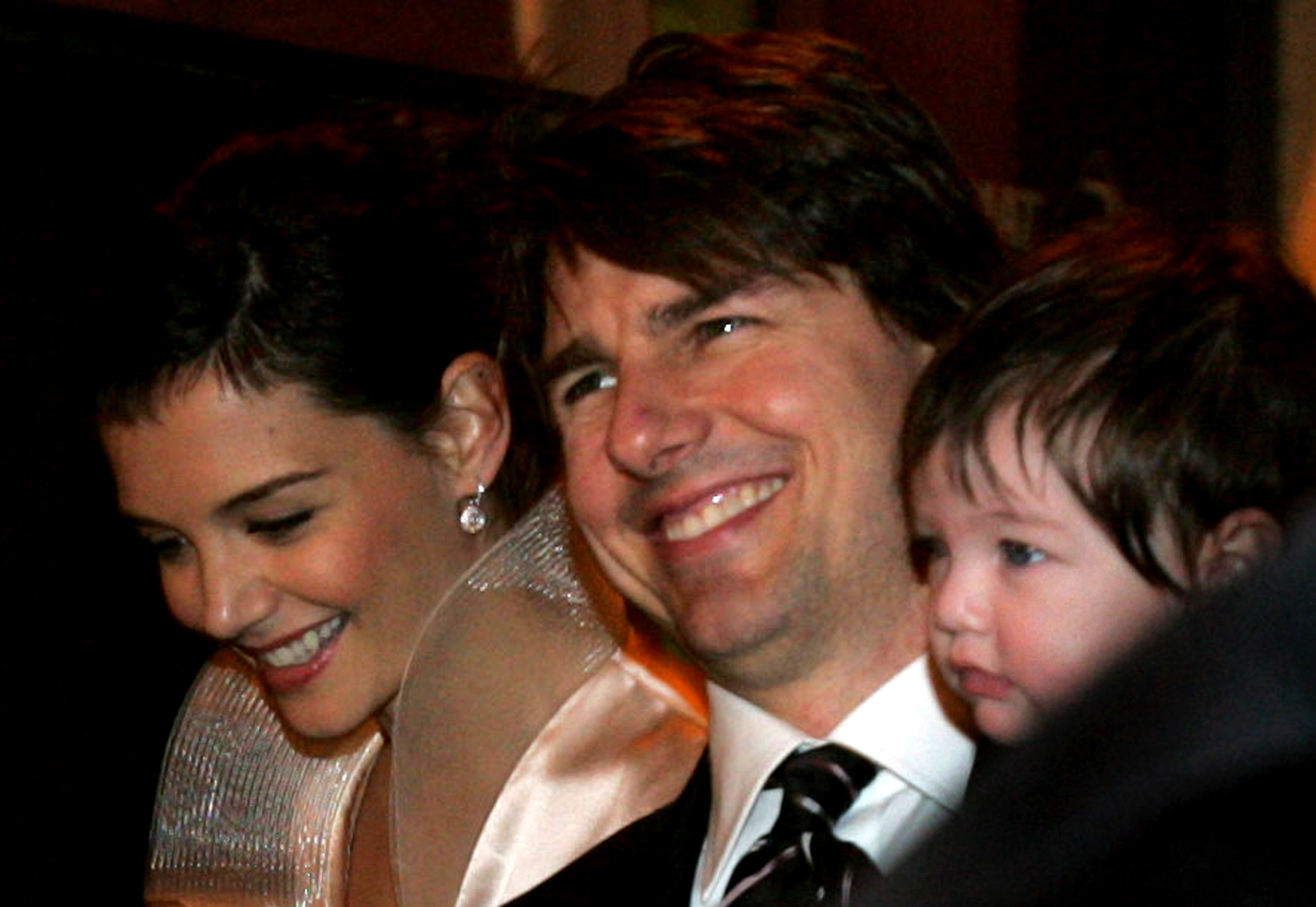 Katie Holmes, Tom and Suri Cruise arrive at the restaurant 'Nino' on November 16, 2006 in Rome, Italy. | Source: Getty Images