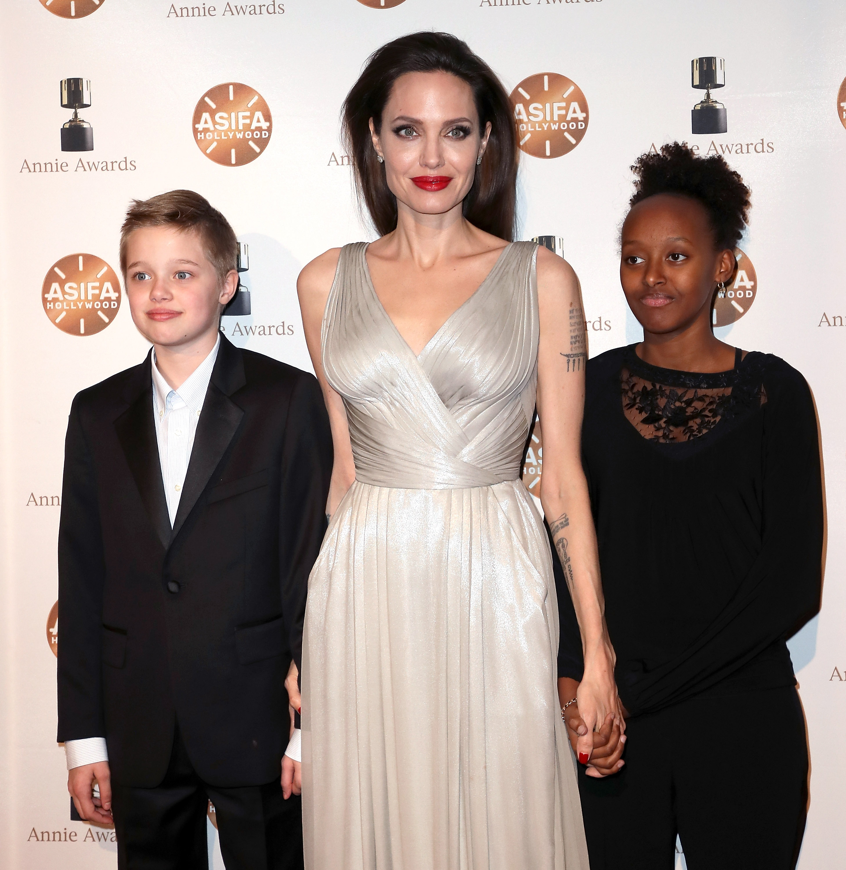 Shiloh Nouvel Jolie-Pitt, actress Angelina Jolie and Zahara Marley Jolie-Pitt attend the 45th Annual Annie Awards on February 3, 2018 in Los Angeles, California. | Source: Getty Images
