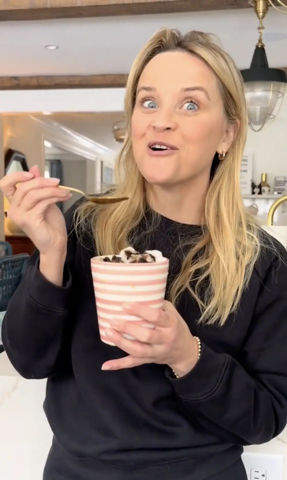 Reese Witherspoon eating her winter dessert, as seen in a video dated January 19, 2024 | Source: tiktok.com/@reesewitherspoon