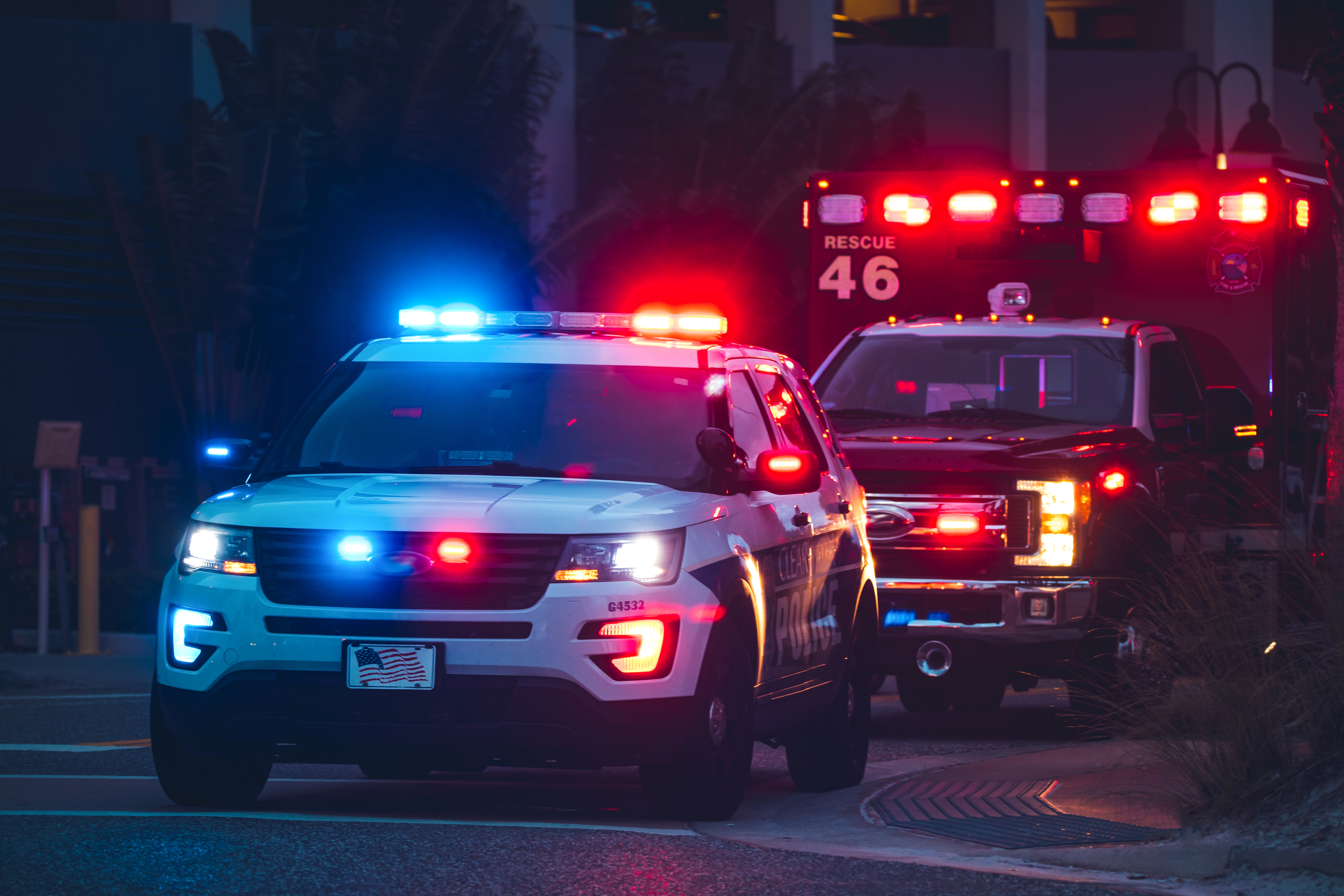 American Police Car and Emergency truck with Blue and red lights| Source: Shutterstock.com