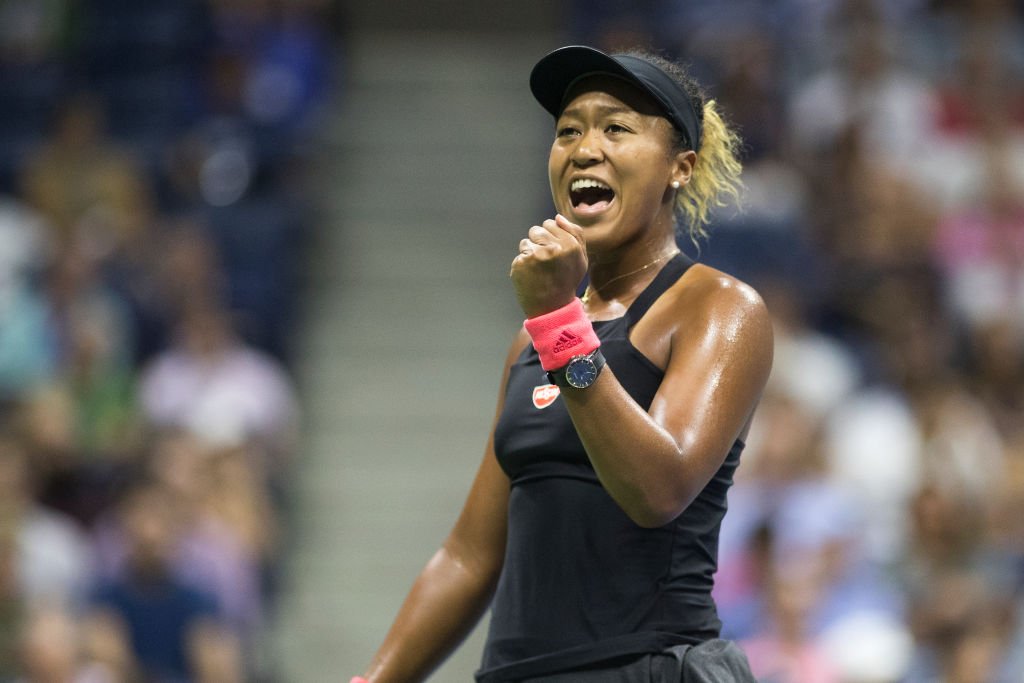 Tennis champion Naomi Osaka celebrates victory during the 2018 US Open Tennis Tournament. | Photo: Getty Images