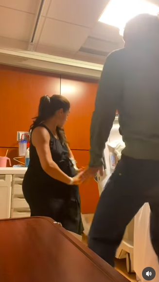 Meghan Markle and Harry dancing in the hospital room. | Source: Instagram/meghan