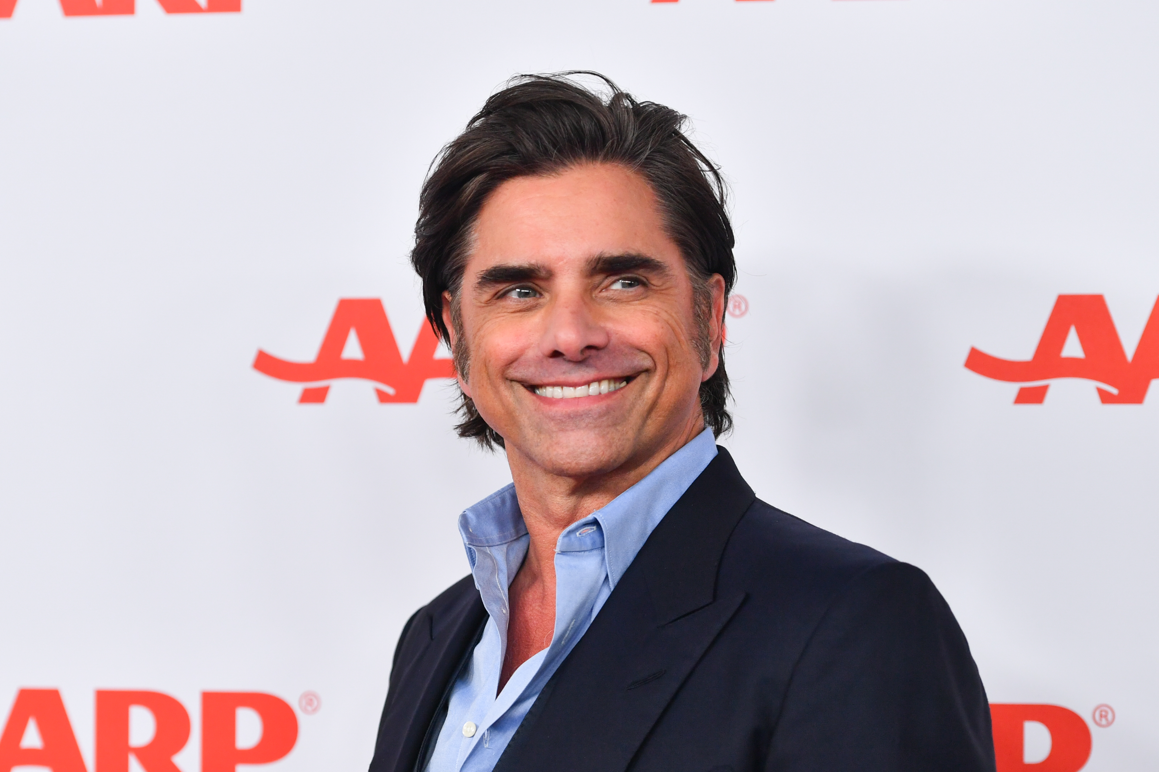 John Stamos attends the AARP Annual Movies for Grownups Awards in Los Angeles, California on February 8, 2025 | Source: Getty Images